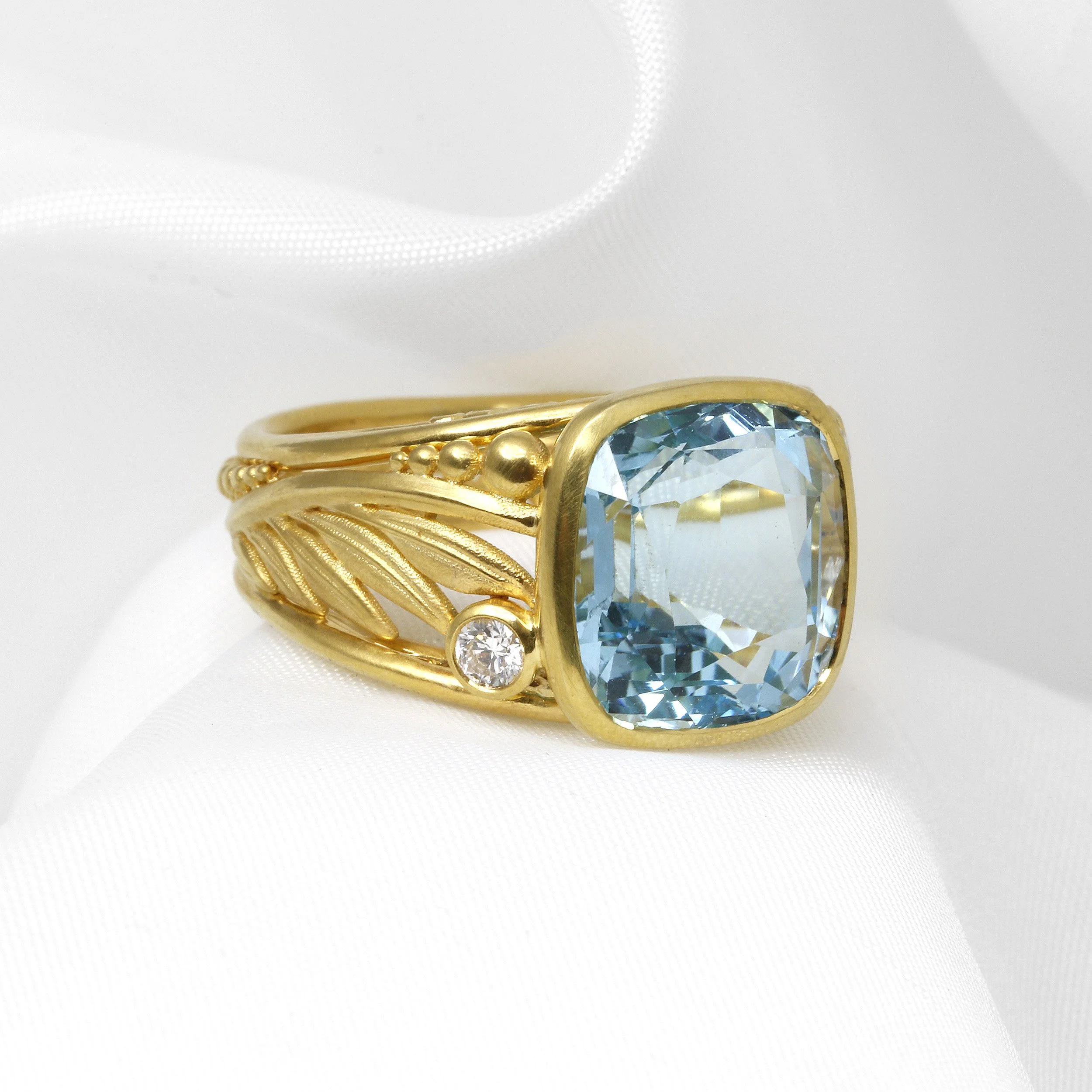 Blue Topaz and Diamond Foliate Dress Ring in 9ct Yellow Gold