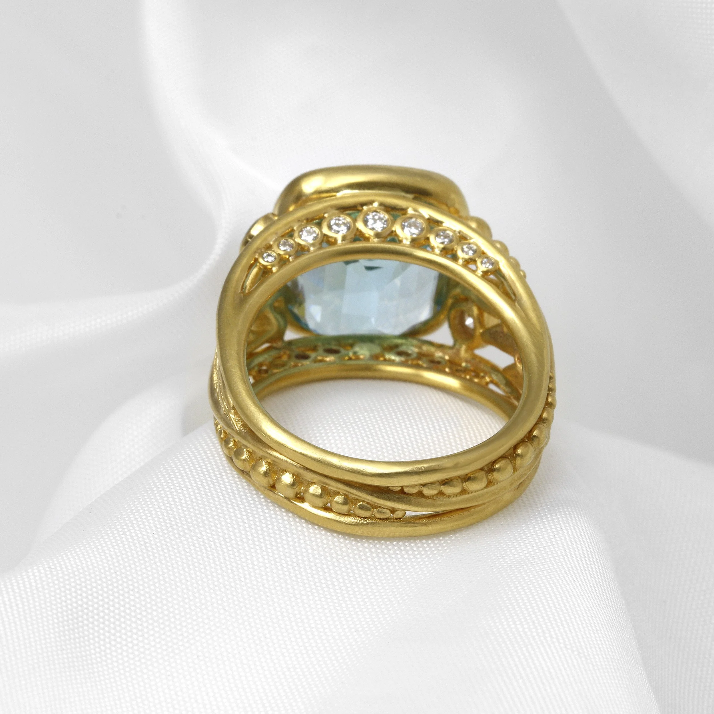 Blue Topaz and Diamond Foliate Dress Ring in 9ct Yellow Gold