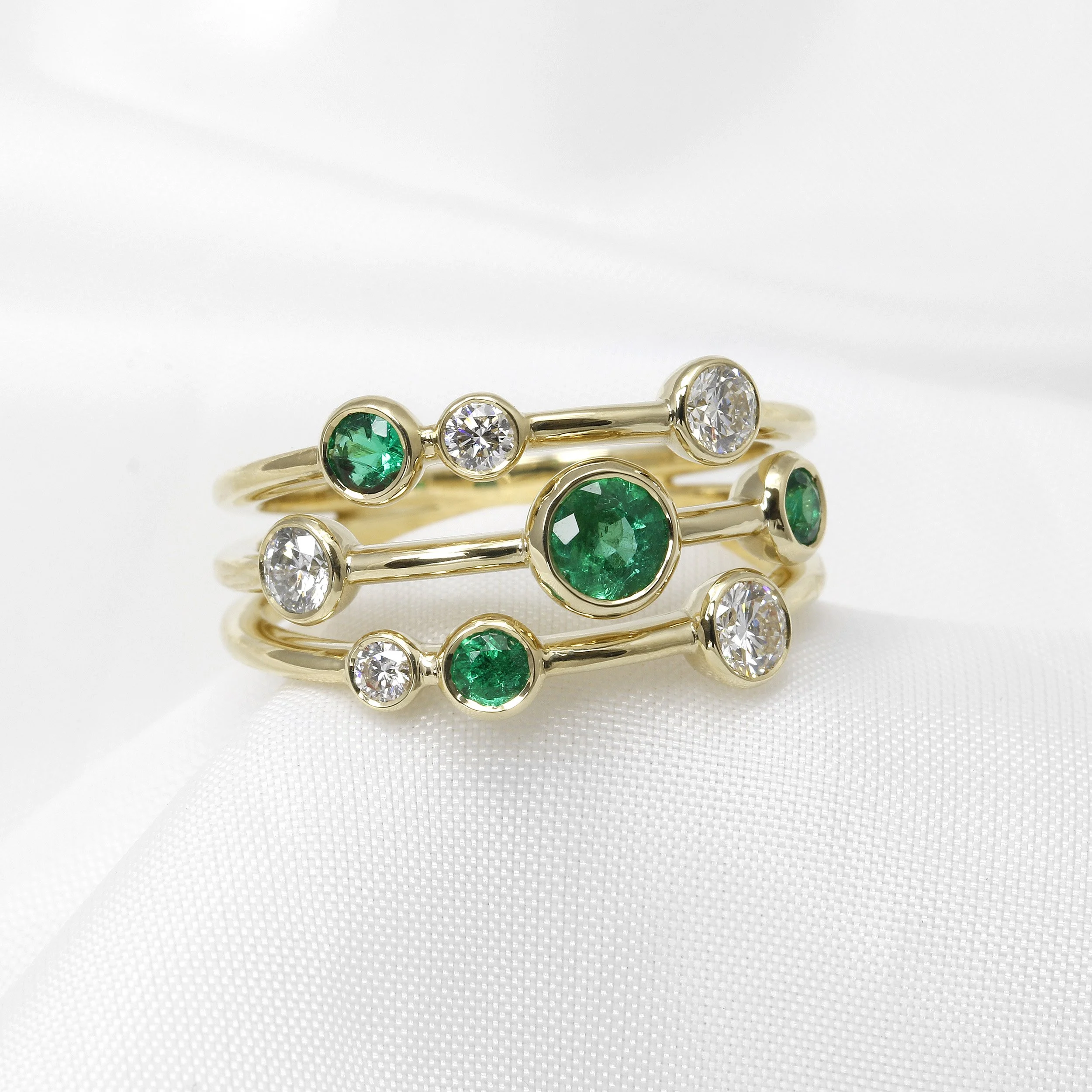 Emerald and Diamond Multi-band Ring in 9ct Yellow Gold
