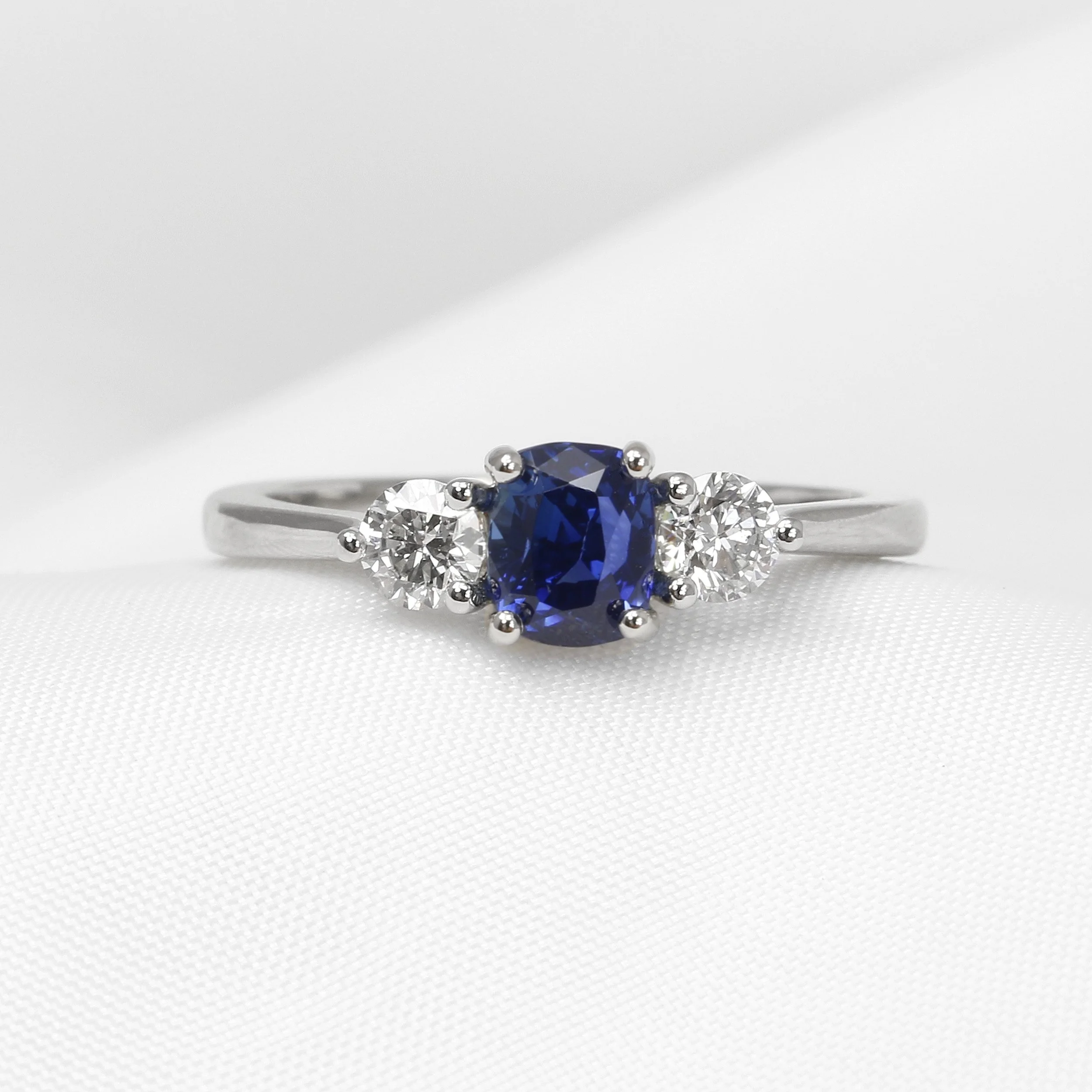  Cushion Sapphire and Diamond Three Stone Ring in Platinum £1,950.00 