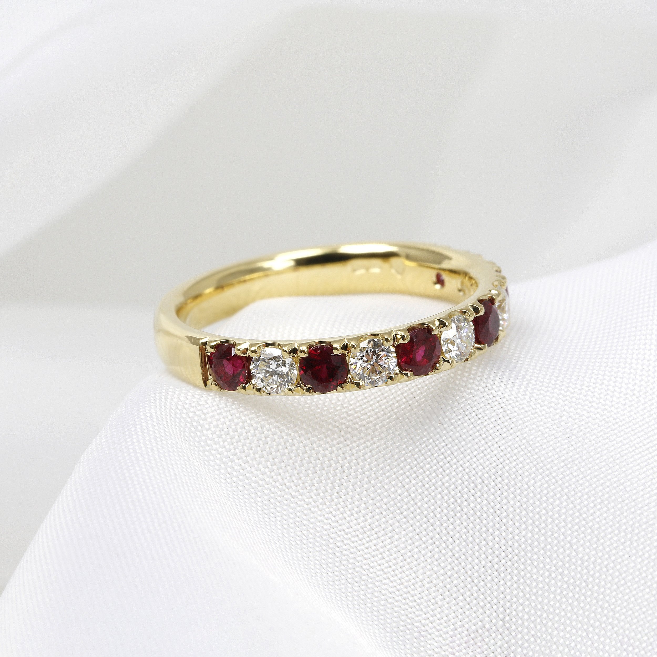  Timothy Roe Claw Set Ruby and Diamond Eternity Ring in 18ct Yellow Gold £2,250.00 