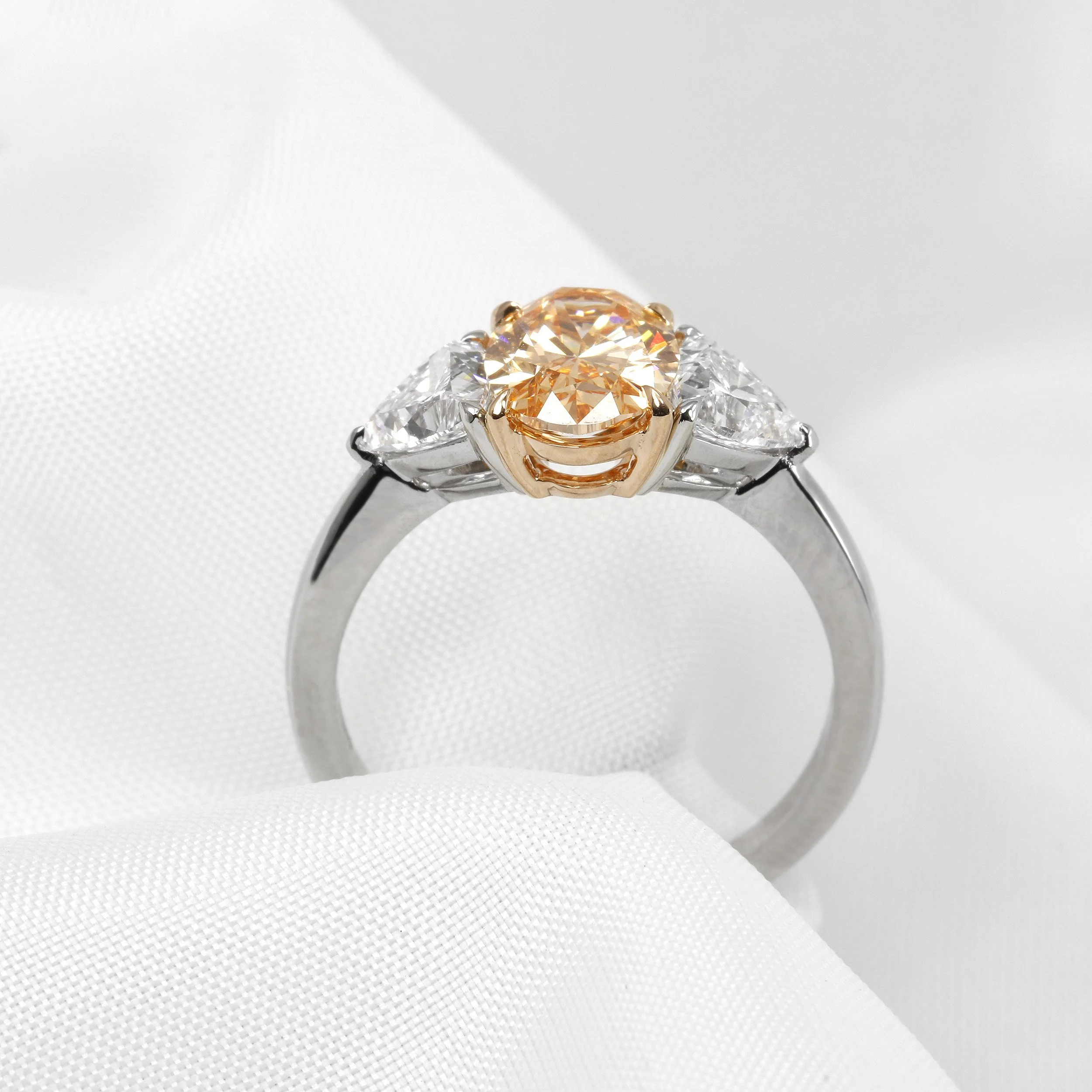 Lab Created Peach Oval and Trillliant Cut Diamond Three Stone Ring