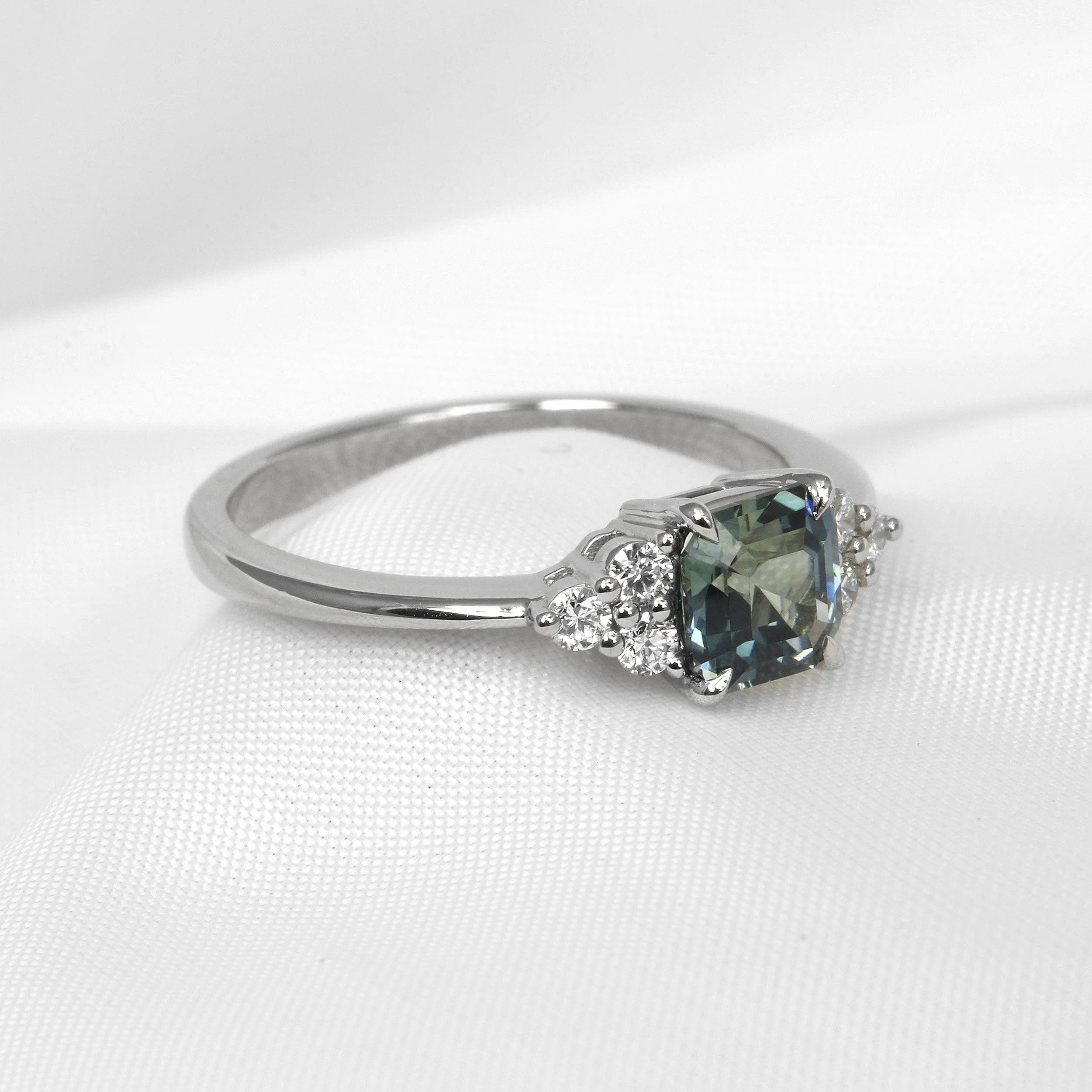Teal Sapphire Ring with Diamond Trefoil in Platinum