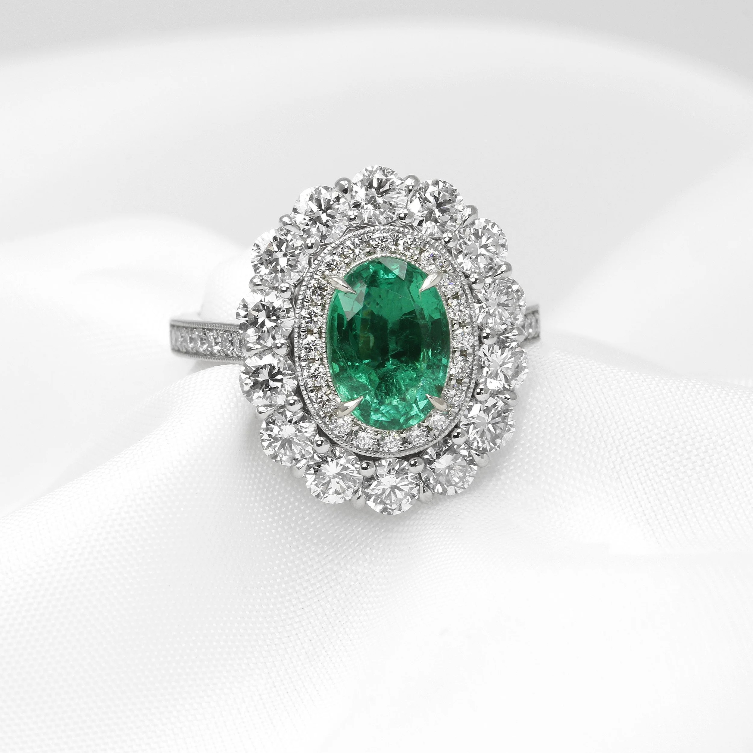  Timothy Roe Emerald and Diamond Double Halo Ring in Platinum £9,995.00 