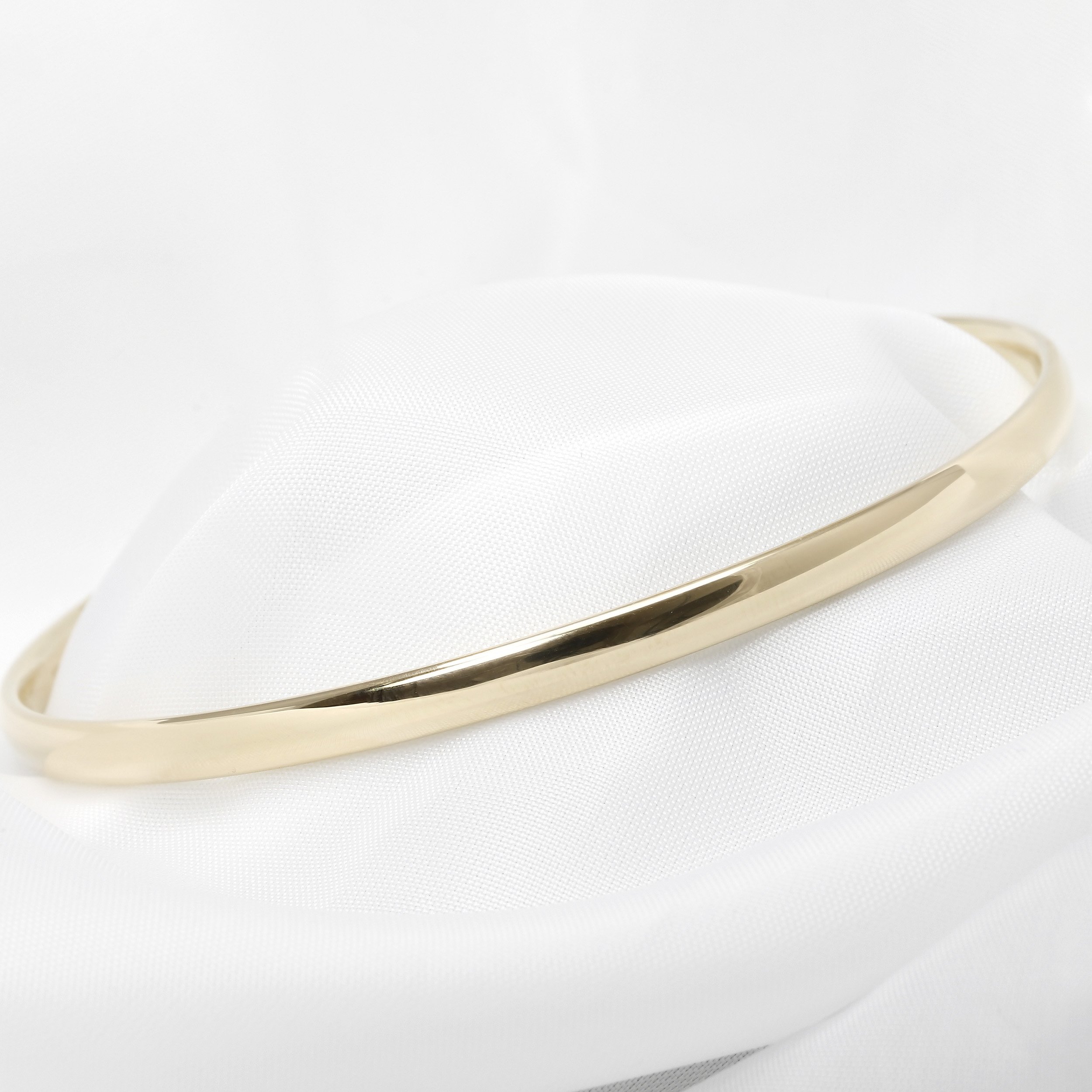  Bangle in Yellow Gold with Court Profile £1,450.00 