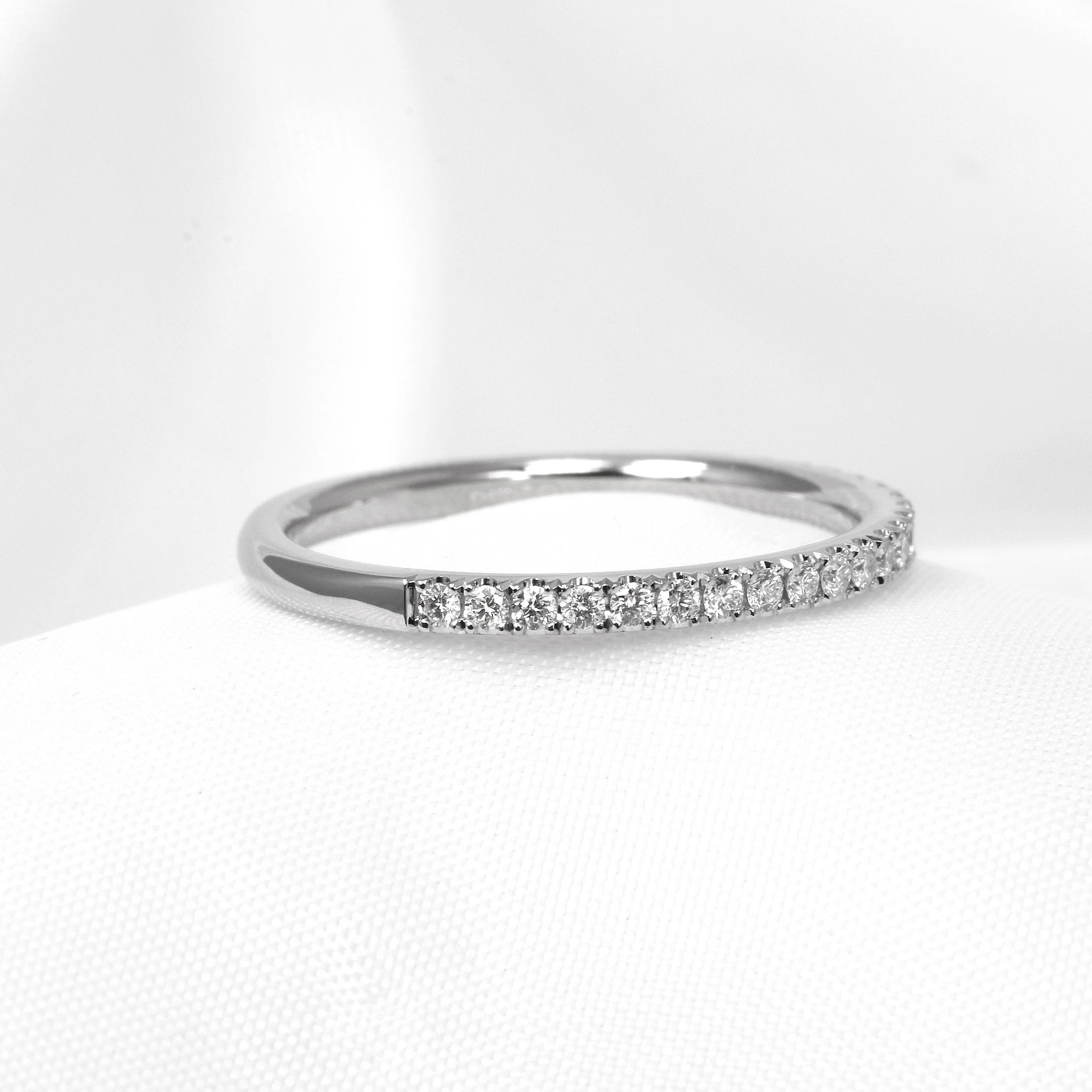 Cutaway Claw Set Diamond Half Eternity Ring in Platinum