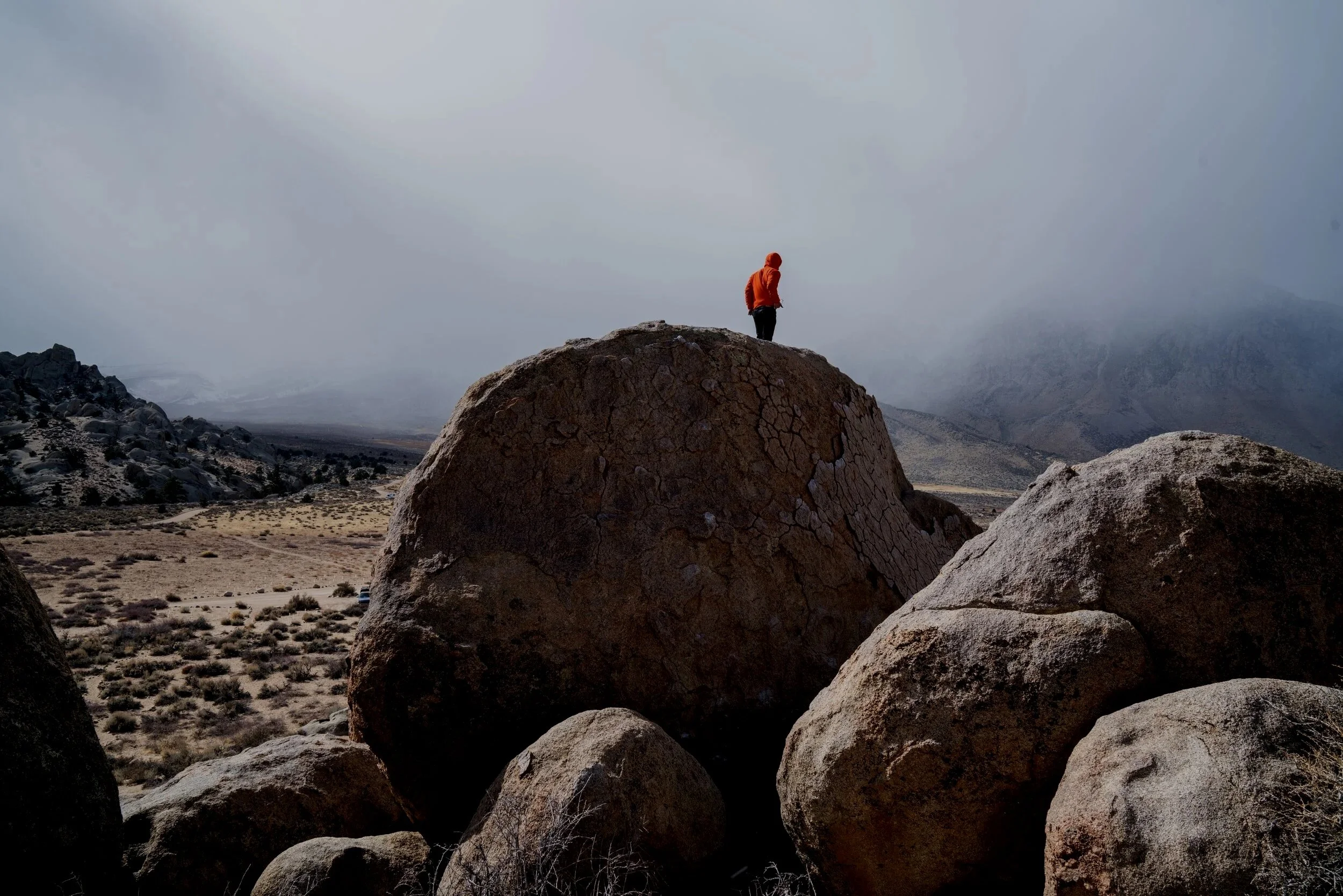 person standing on rock