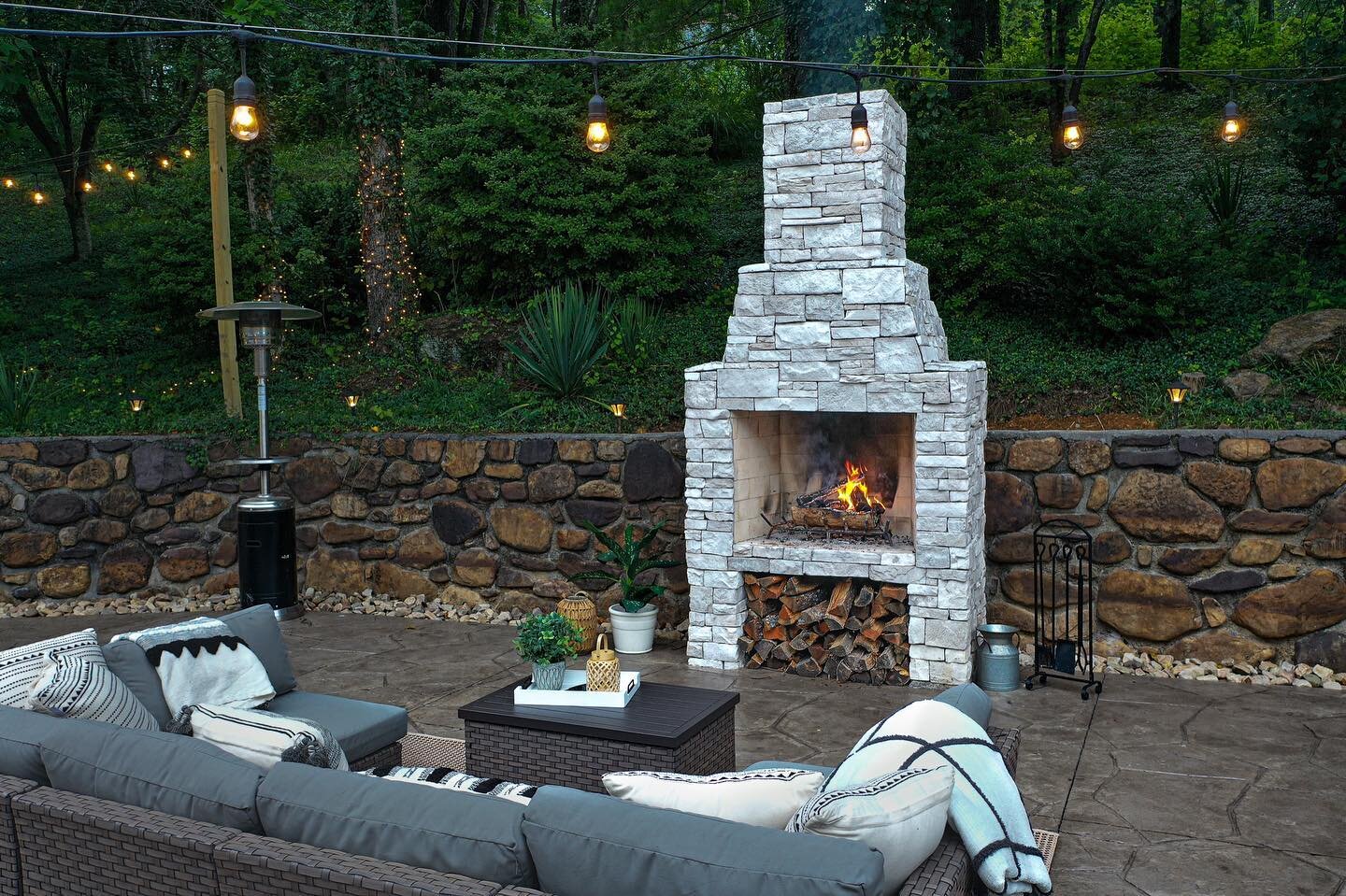 Cozy enough to always want to be at home. Recently installed fire place with wood storage and stamped &amp; stained concrete patio.
&bull;
&bull;
&bull;
#patiodesign #RoanokeLandscapes #landscaping #hardscaping #hardscapes #outdoorliving #outdoorlivi