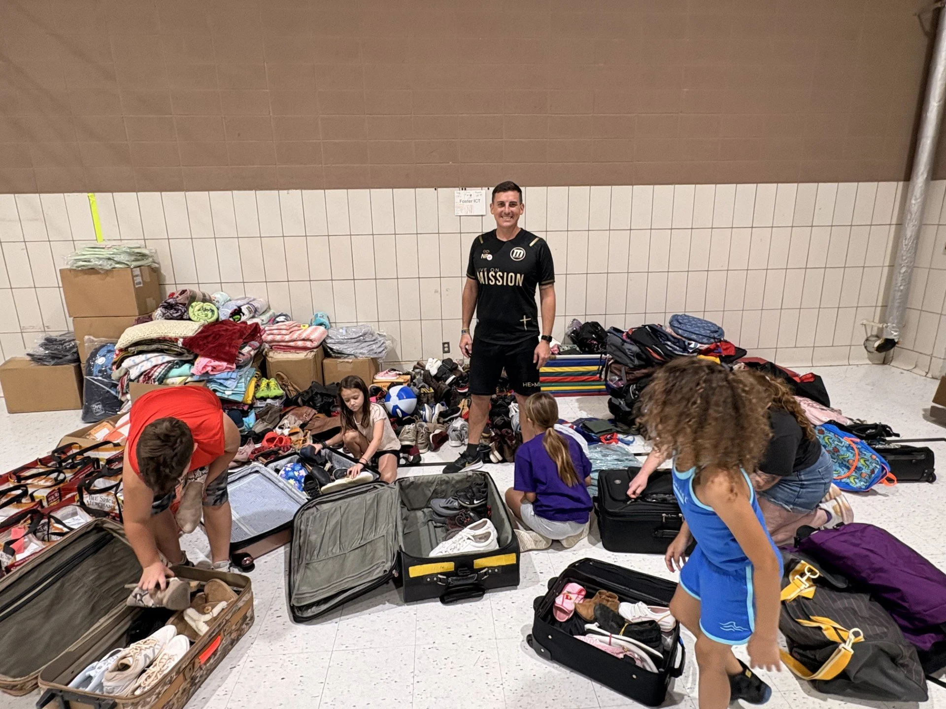 Nathan Paulus with FosterICT and their distributed donations
