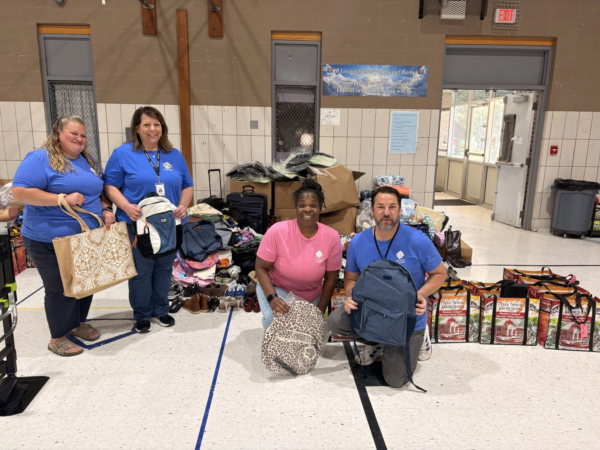 DCCCA team and their distributed donations