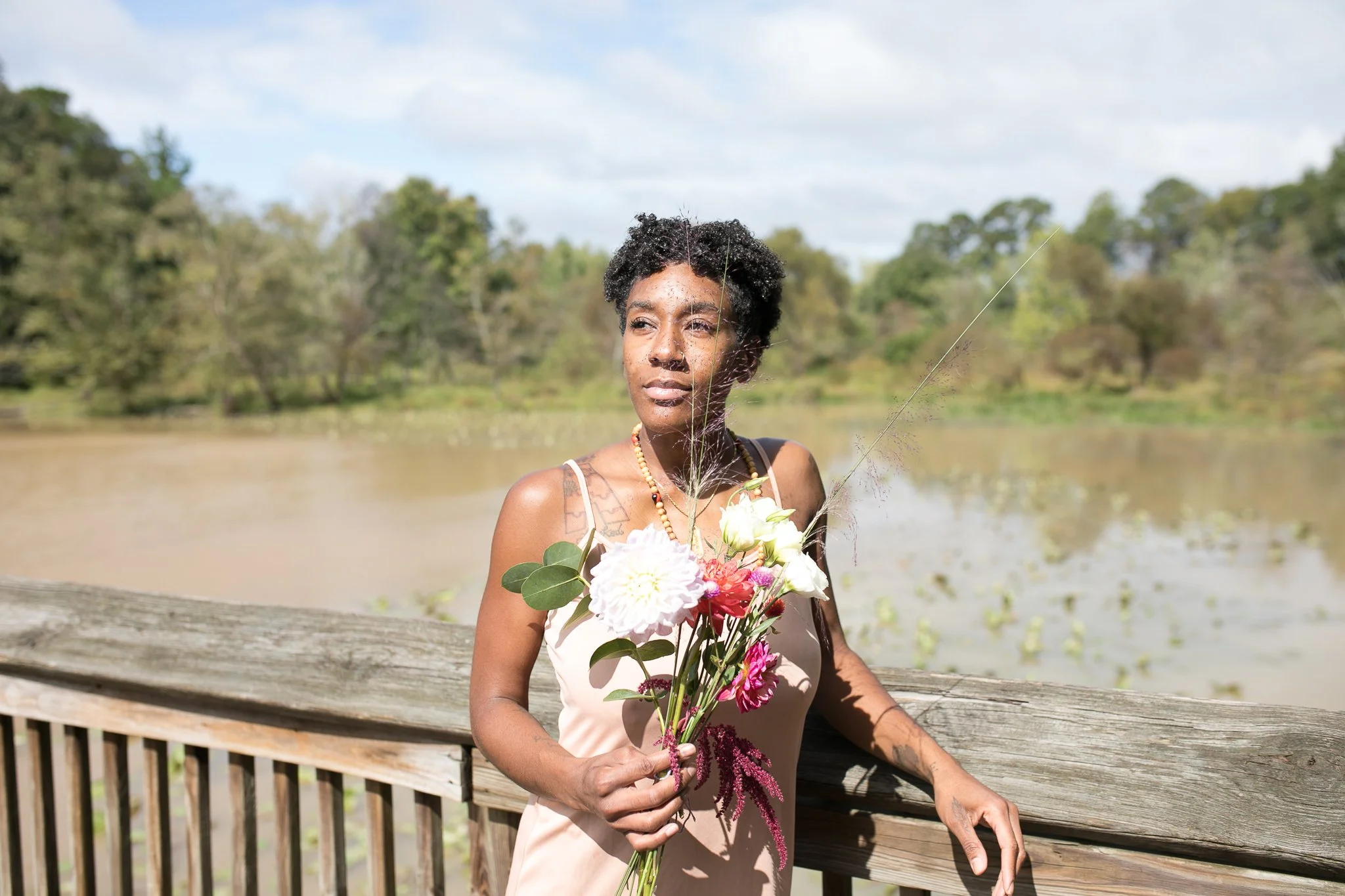 Black woman in nature, regulating her nervous system and dreaming