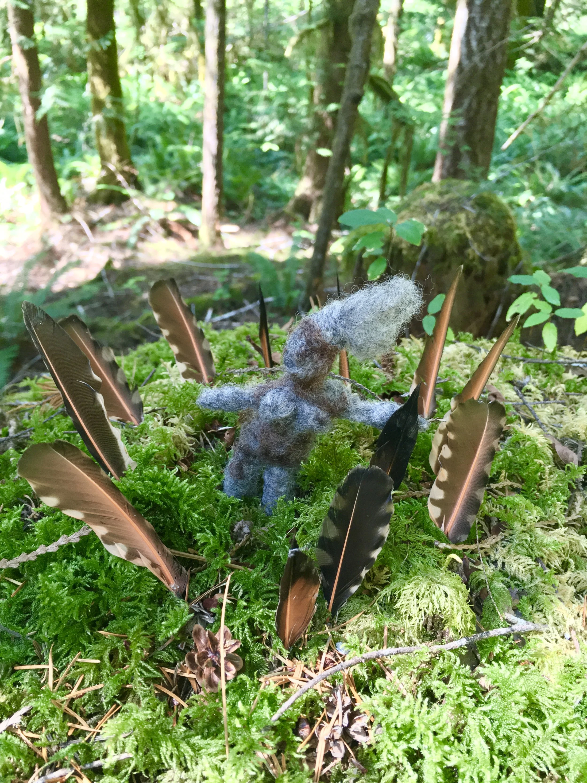Sarah West artist flicker feathers and felted figure.jpg