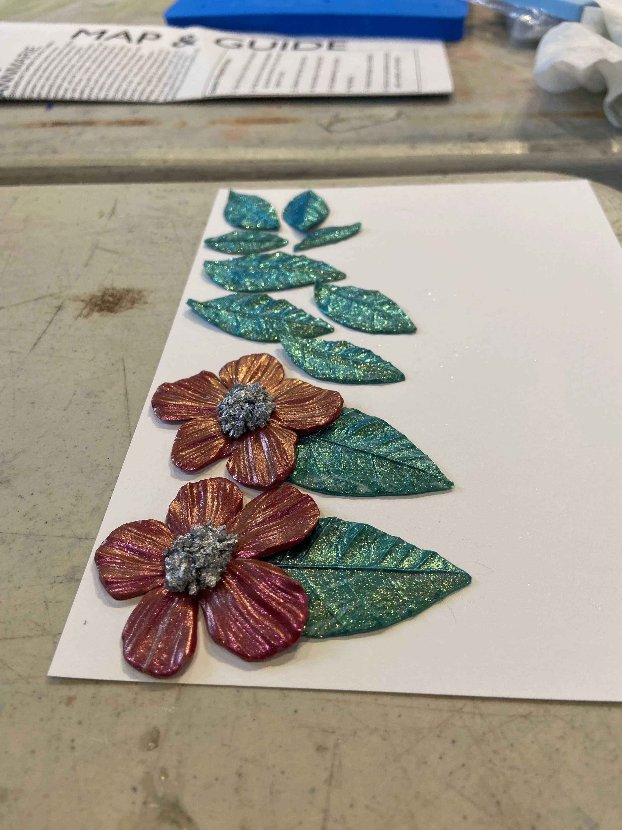 A new take on sculpted florals and dangling leaves