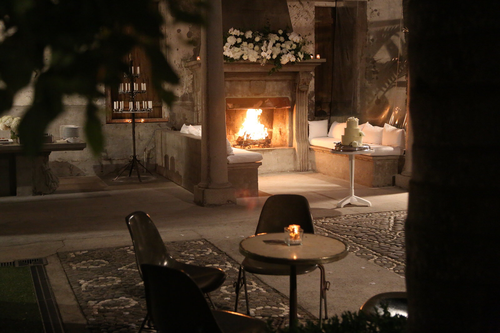 Mantells Mt Eden Venue hire | Private courtyard, ivy-covered walls, open fireplace, palm trees, beautiful food & BYO wine