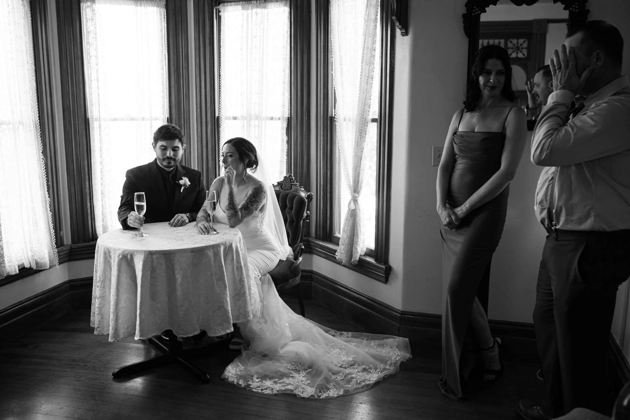 A black and white documentary style wedding photo in Portland, OR