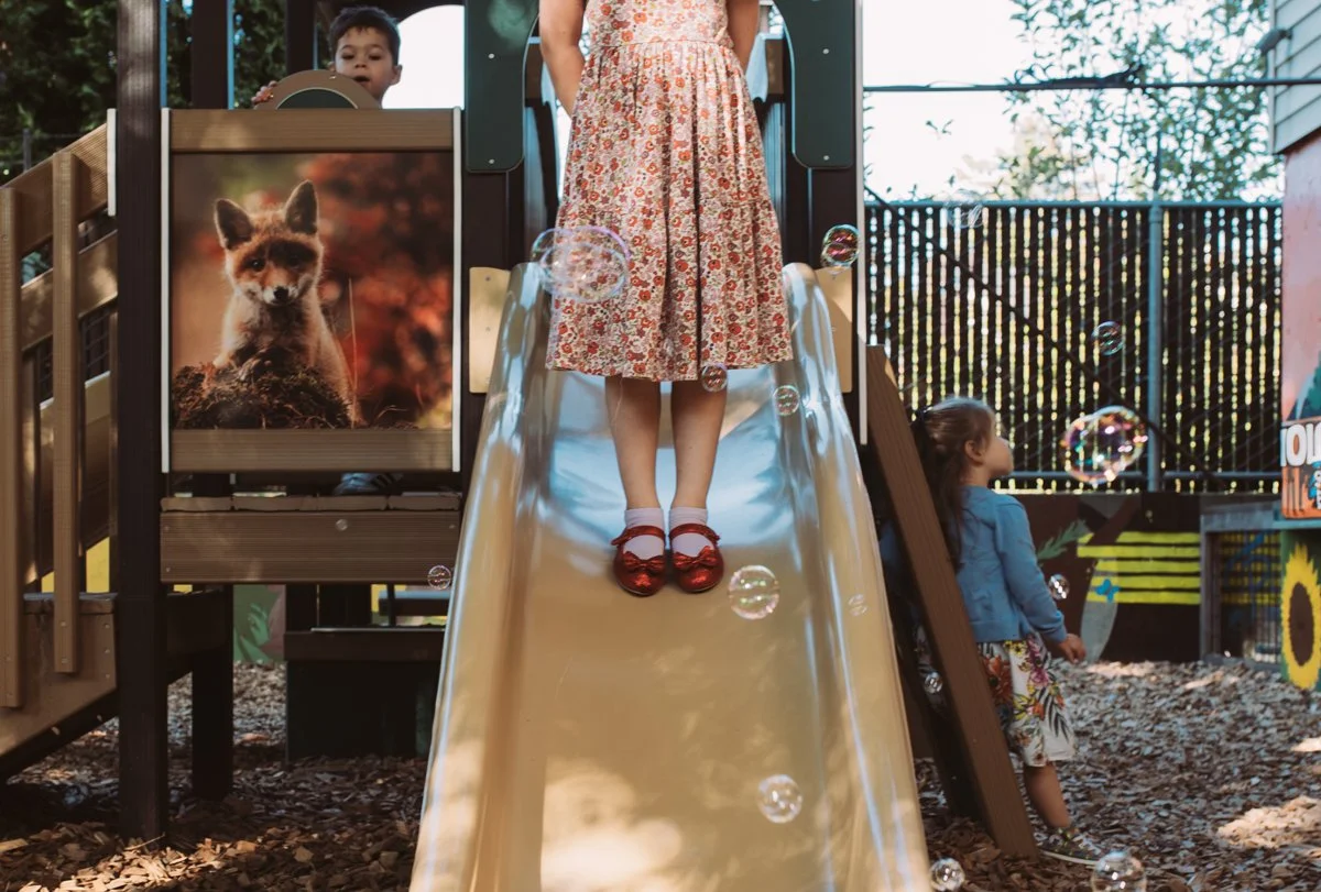 Candid photo of family slide in Portland, Oregon