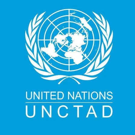 United Nations UNCTAD logo featuring a white globe with a grid showing continents, surrounded by olive branches on a blue background.