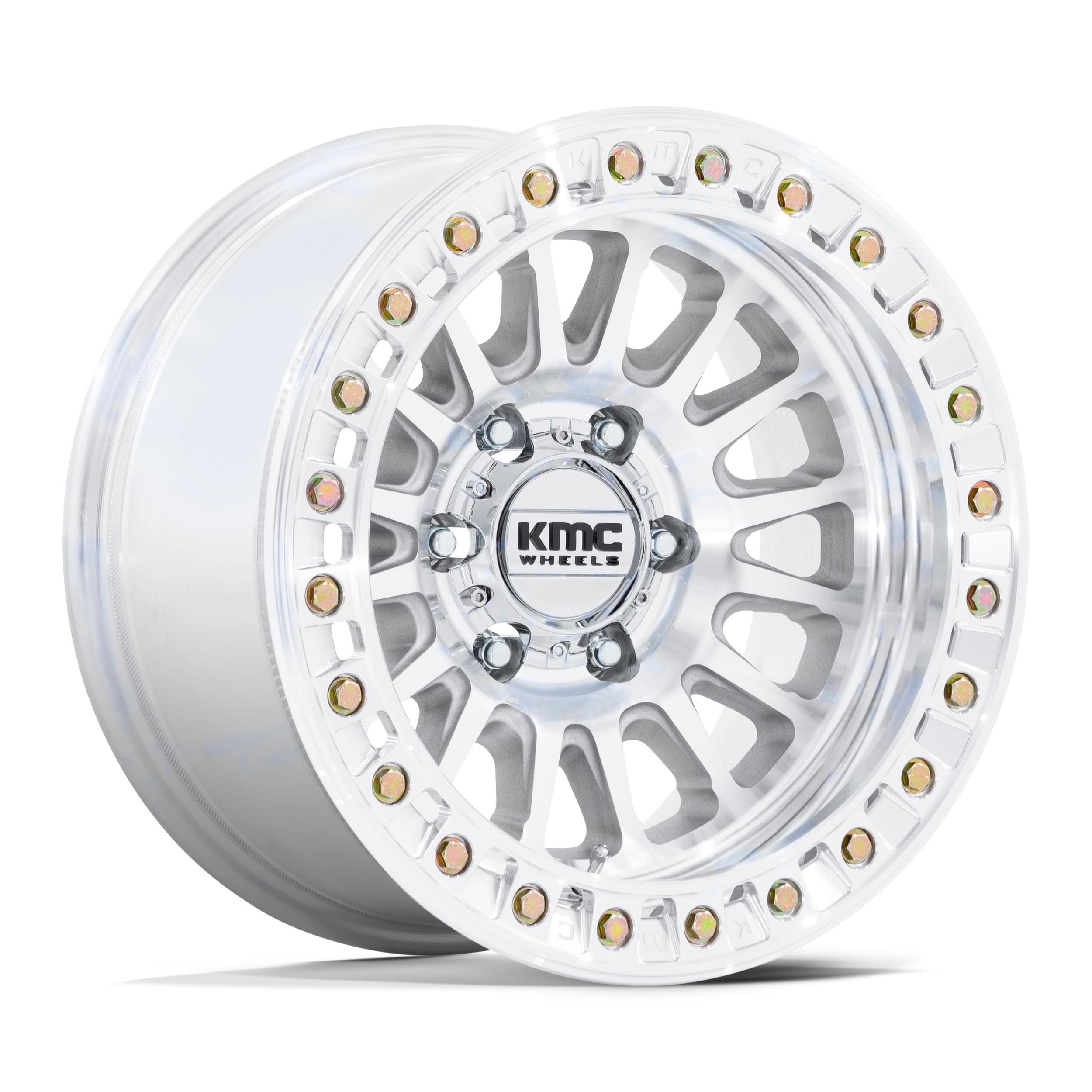 A silver KMC Wheels alloy rim for a vehicle, featuring a multi-spoke design and colorful bolts around the outer edge.