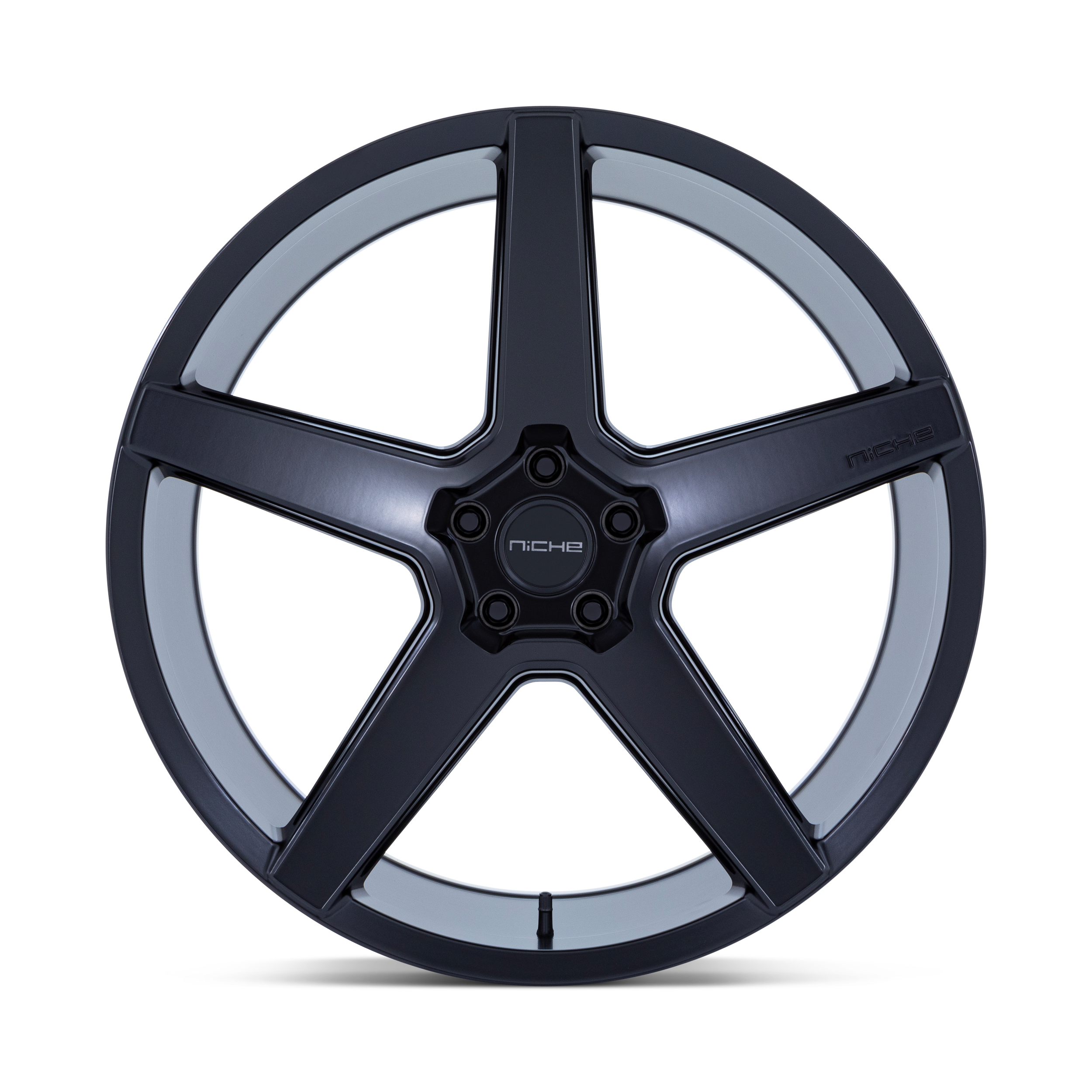 A black and silver camera-style film reel with the word 'NICHE' written in the center.