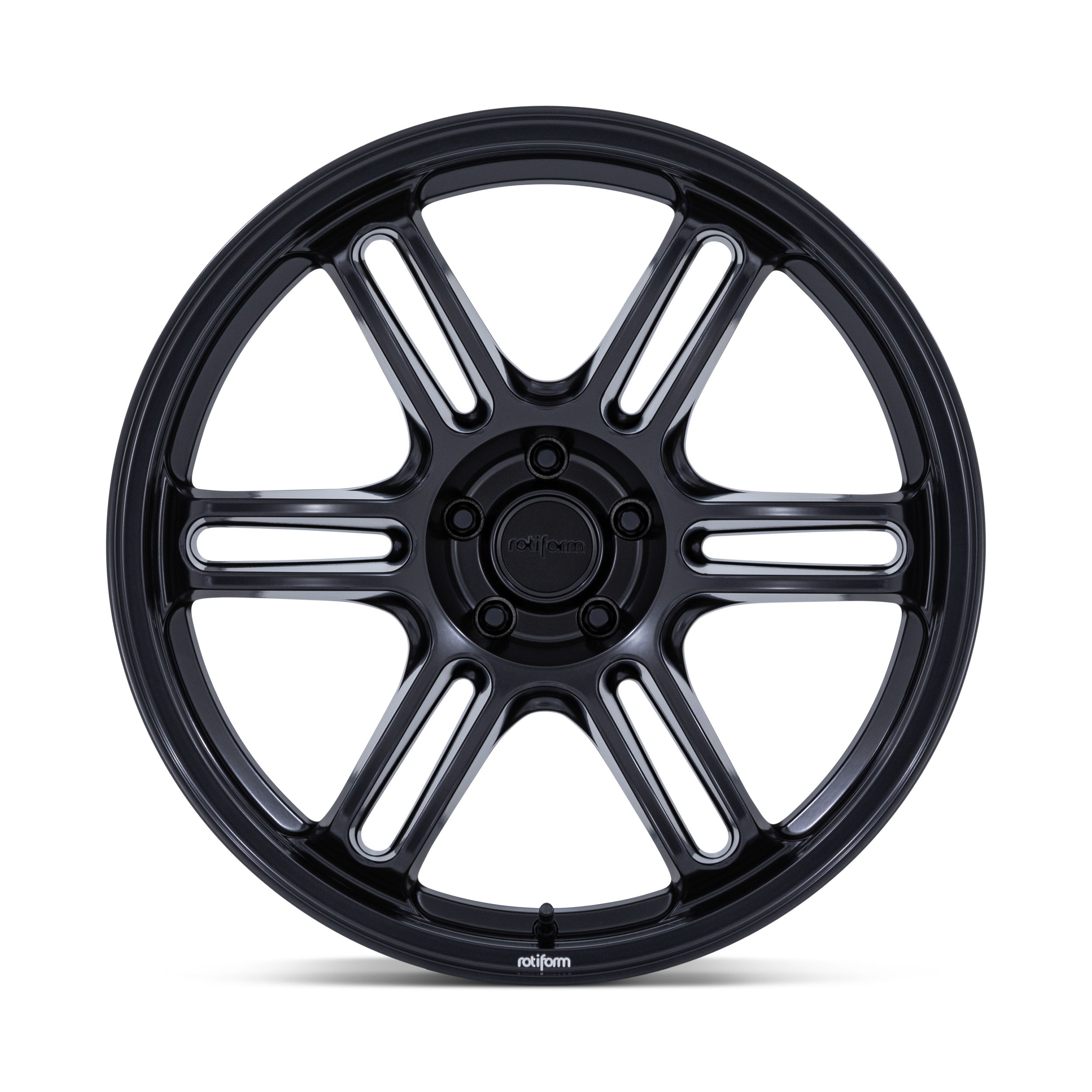 Black alloy wheel with colored sections in red, gray, teal, and white.