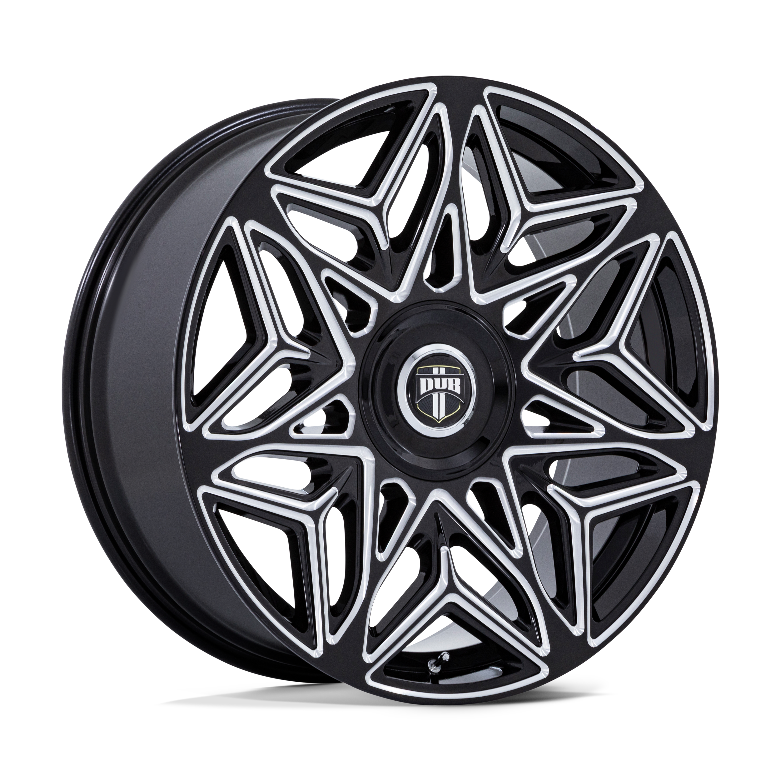 A black and silver car wheel rim with a geometric star pattern and centered logo that says DUB.
