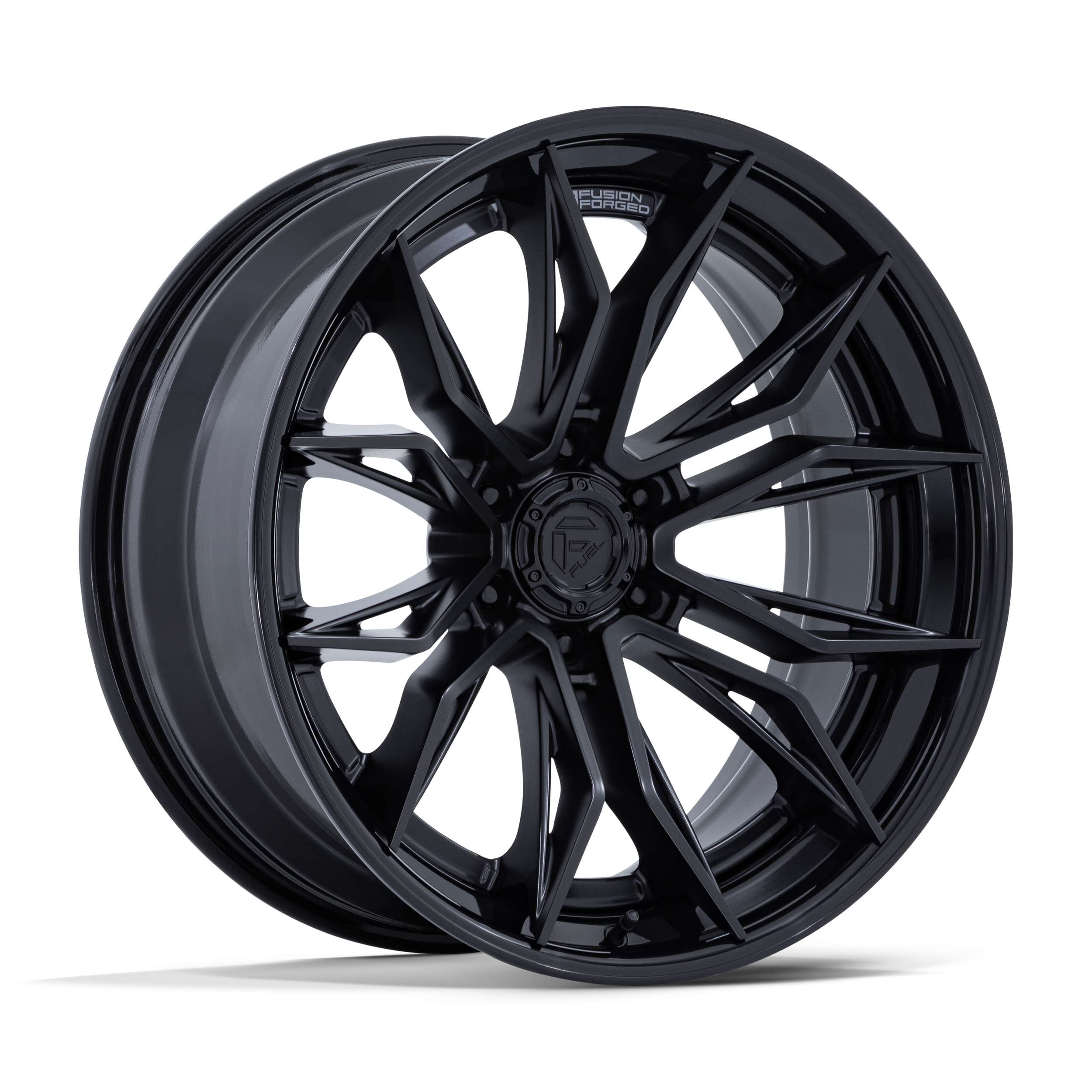 Black alloy wheel with a complex multi-spoke design against a black background.