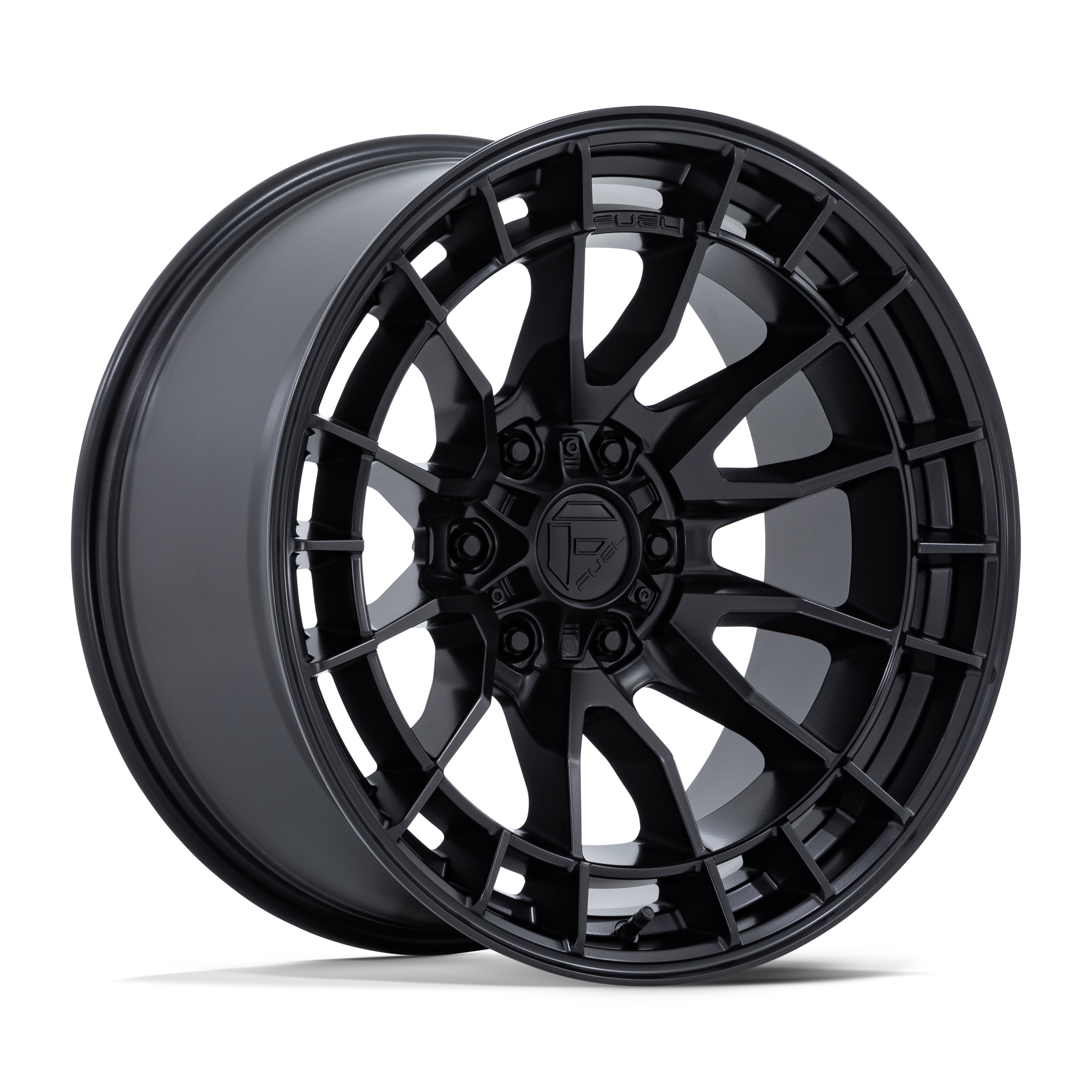 Black multi-spoke alloy wheel with a dark finish and a central logo.