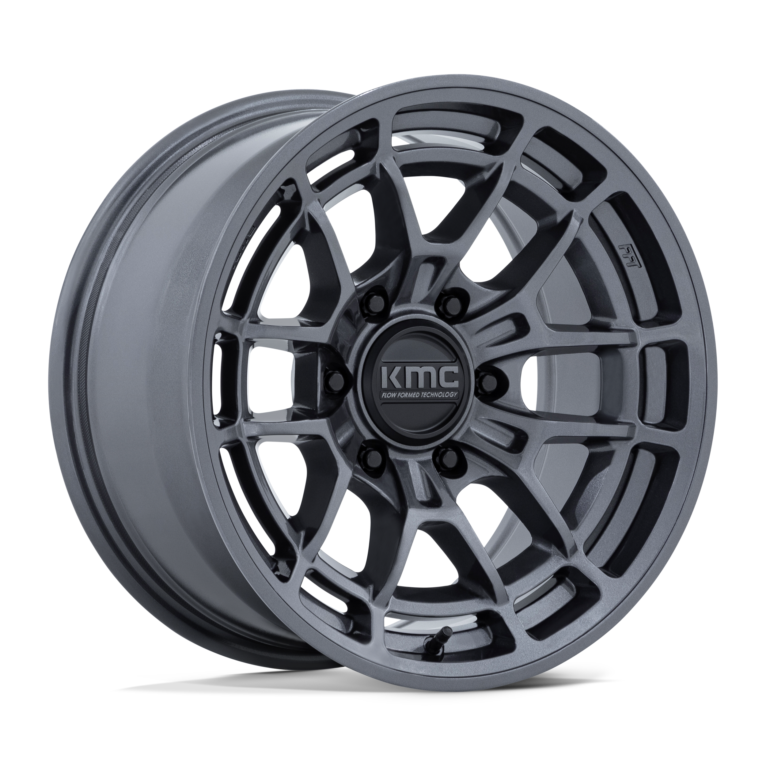 A black, multi-spoke alloy wheel with a central cap labeled 'KMC Flow Formed Technology'