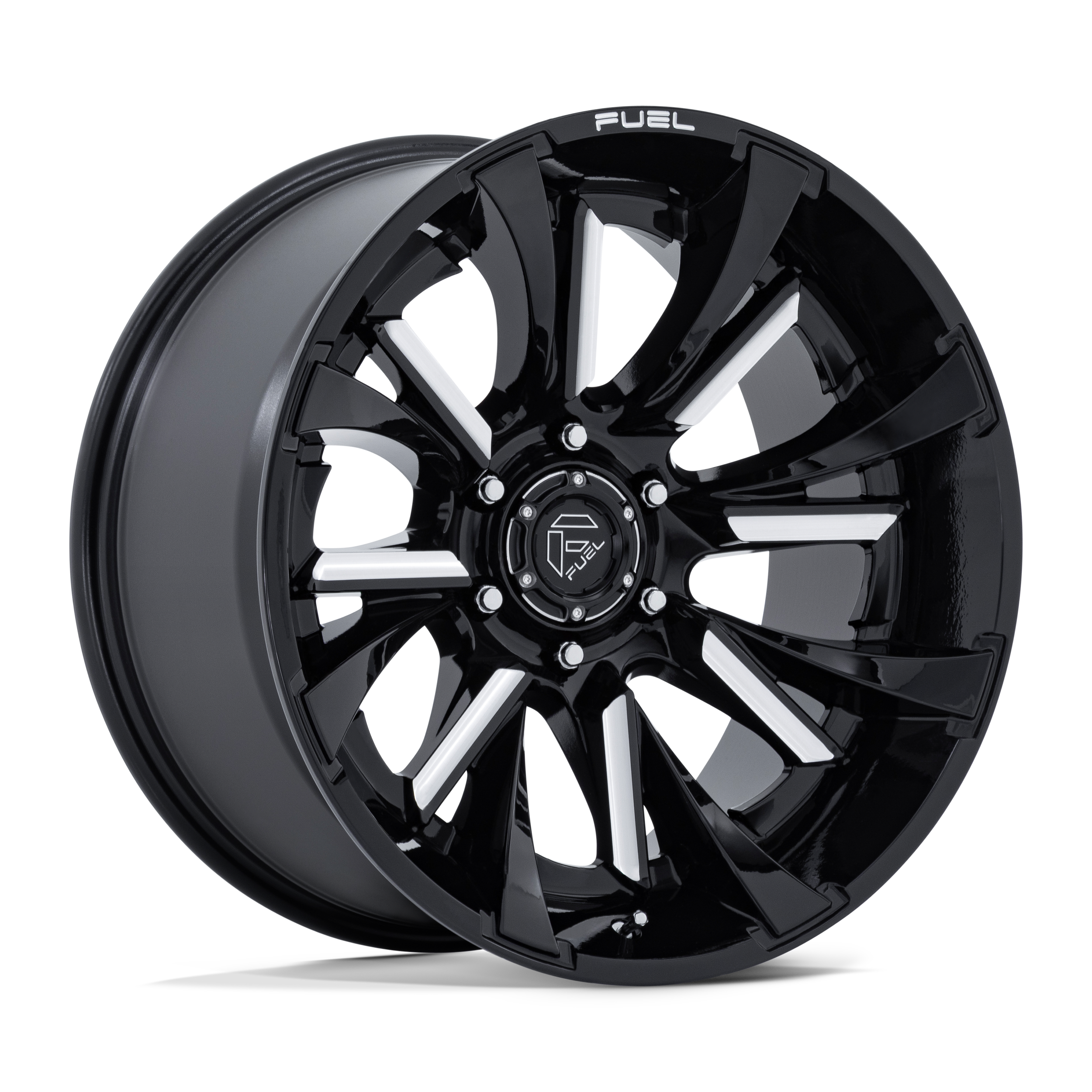 Black and chrome alloy car wheel with "FUEL" branding on the center cap, isolated on black.