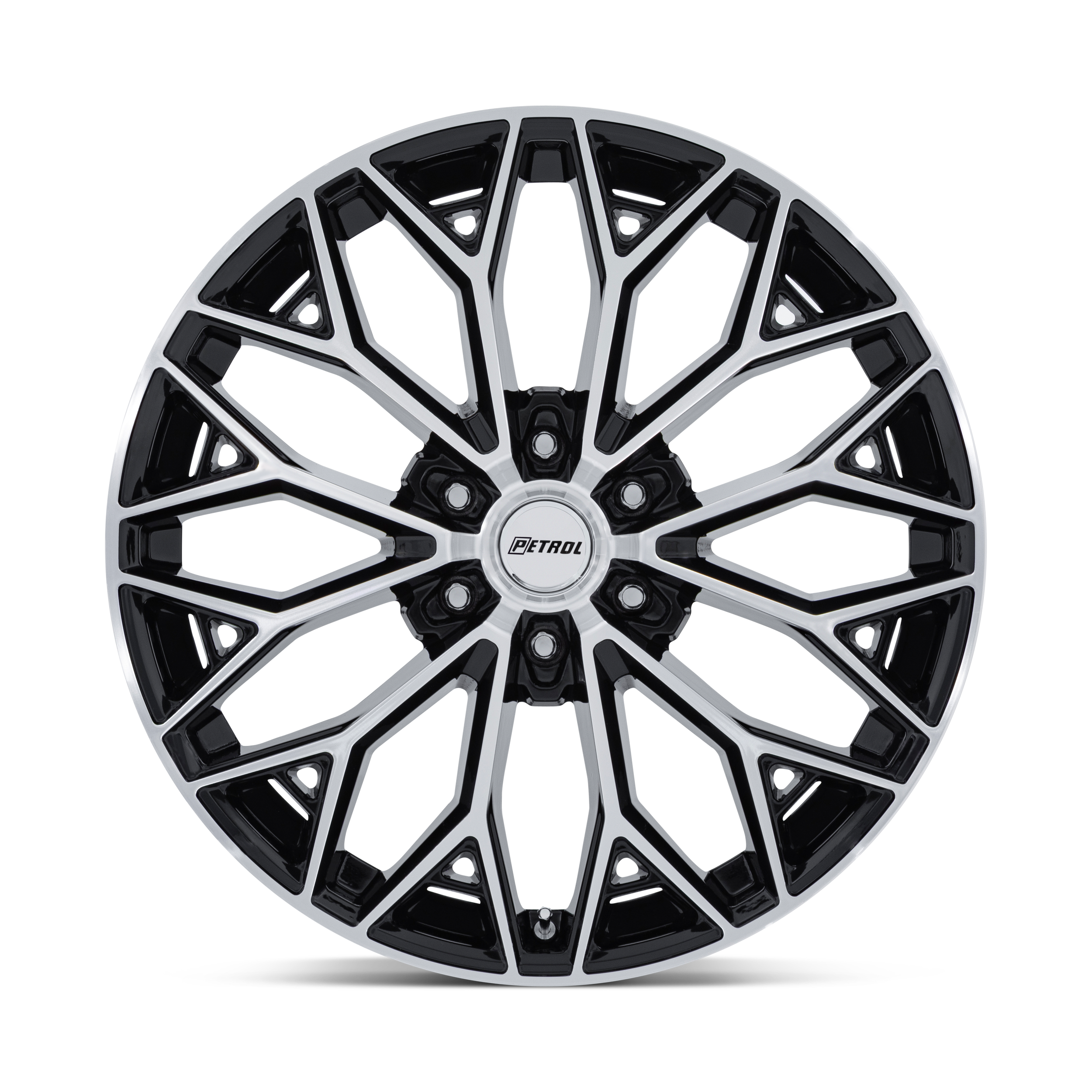 A modern alloy car wheel with a black and silver geometric spoke design, centered with a silver hub cap labeled PETROL.