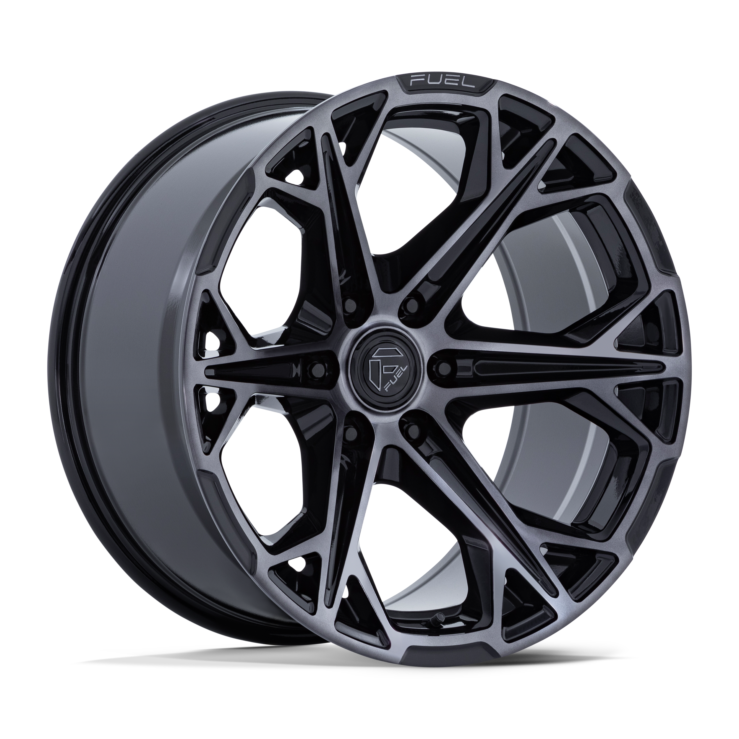 An automotive alloy wheel with a distinctive black and silver design, featuring the 'Fuel' logo in the center.