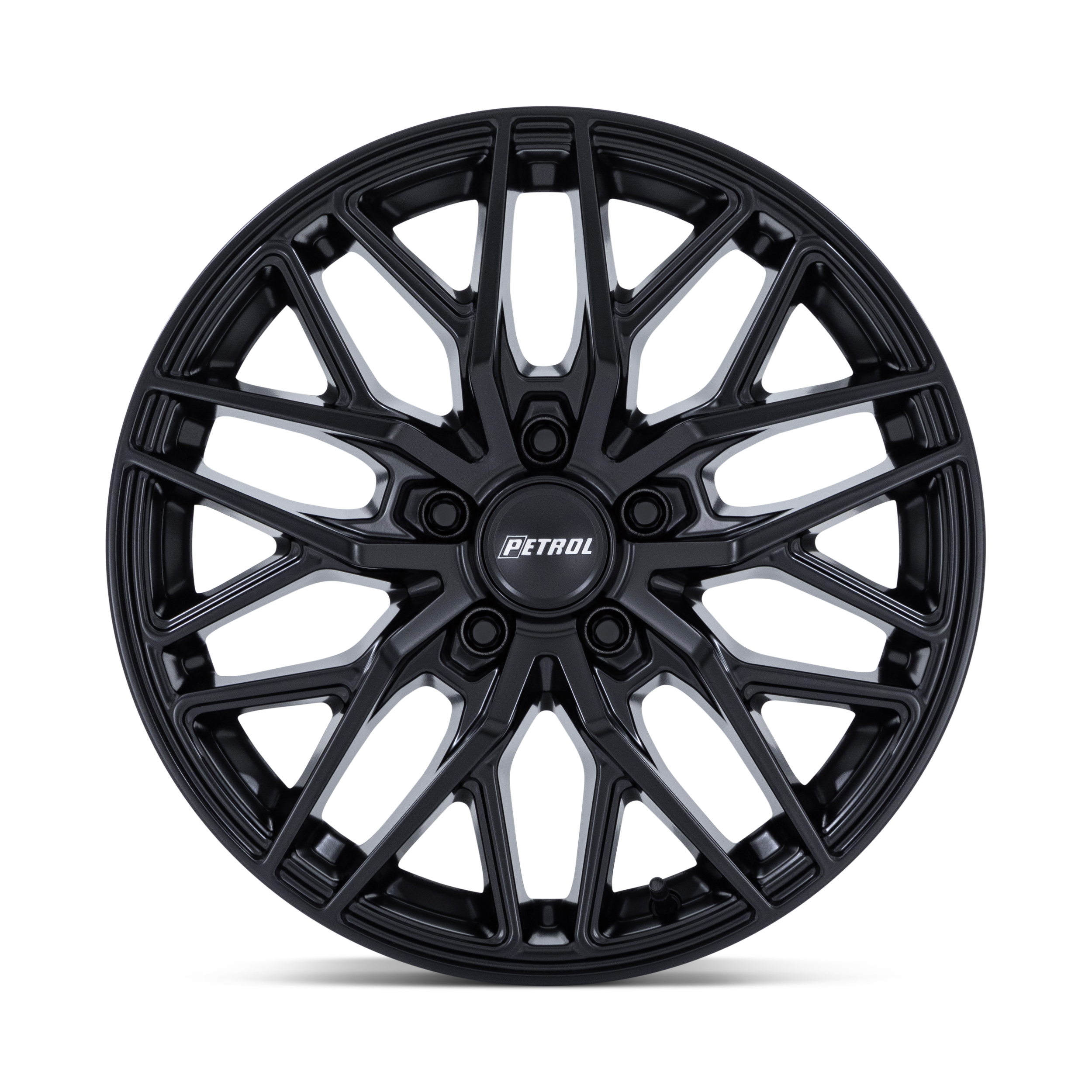 Black alloy car wheel with intricate spoke design and a center cap labeled 'PETROL'.