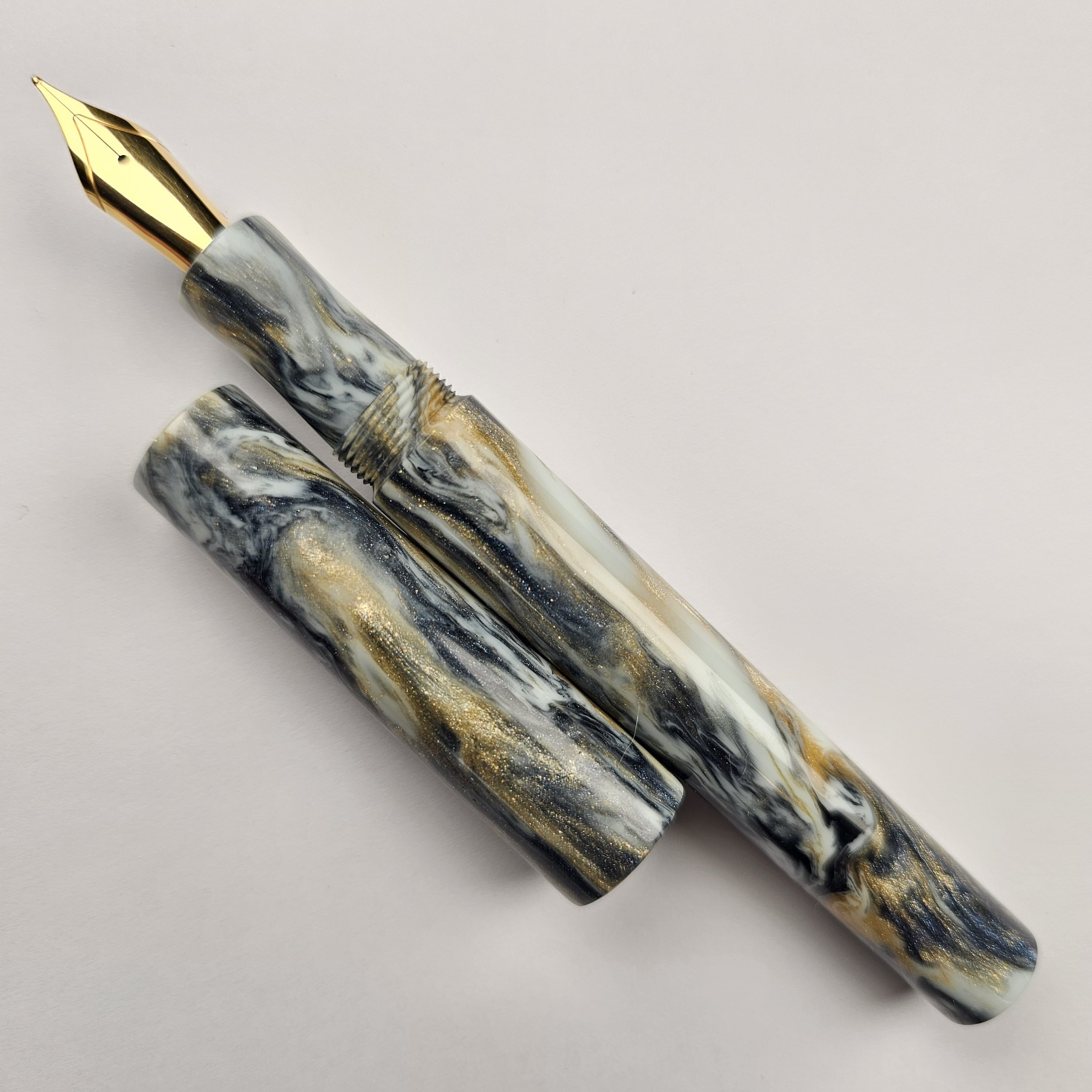 DiamondCast - Black white and gold