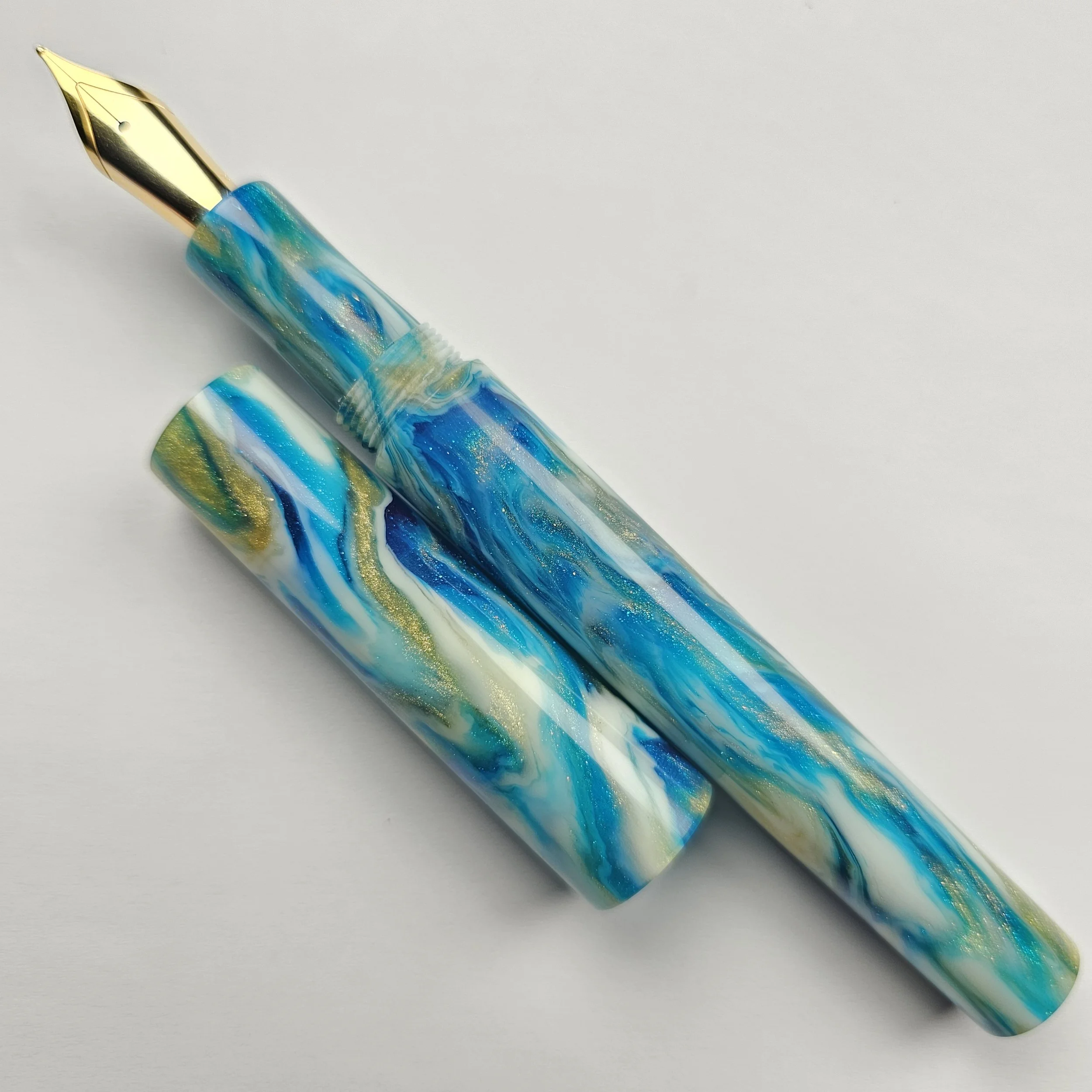 DiamondCast - Blue green gold and white