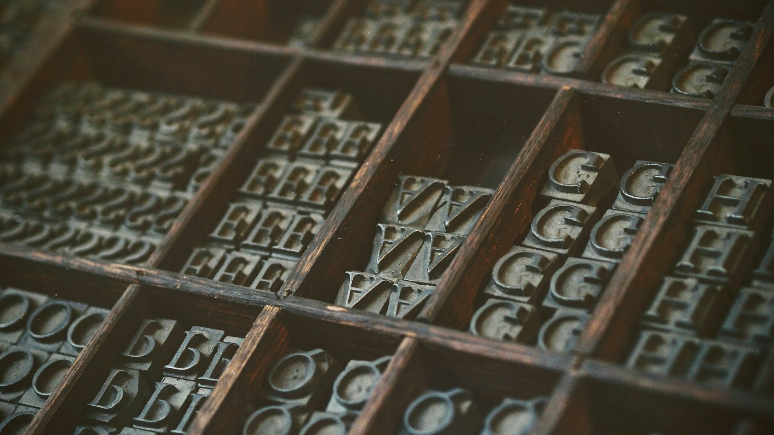 different alphabet laid out like books