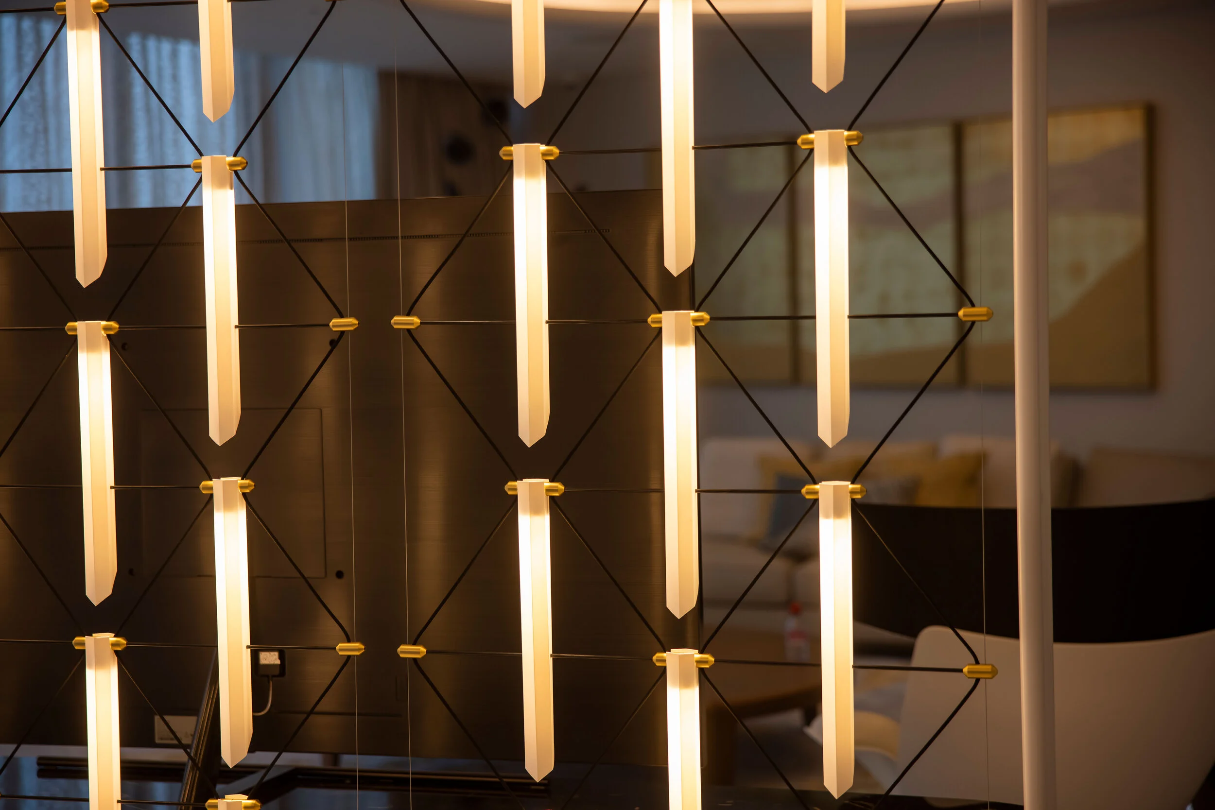 light installation with a series of vertically placed light rods