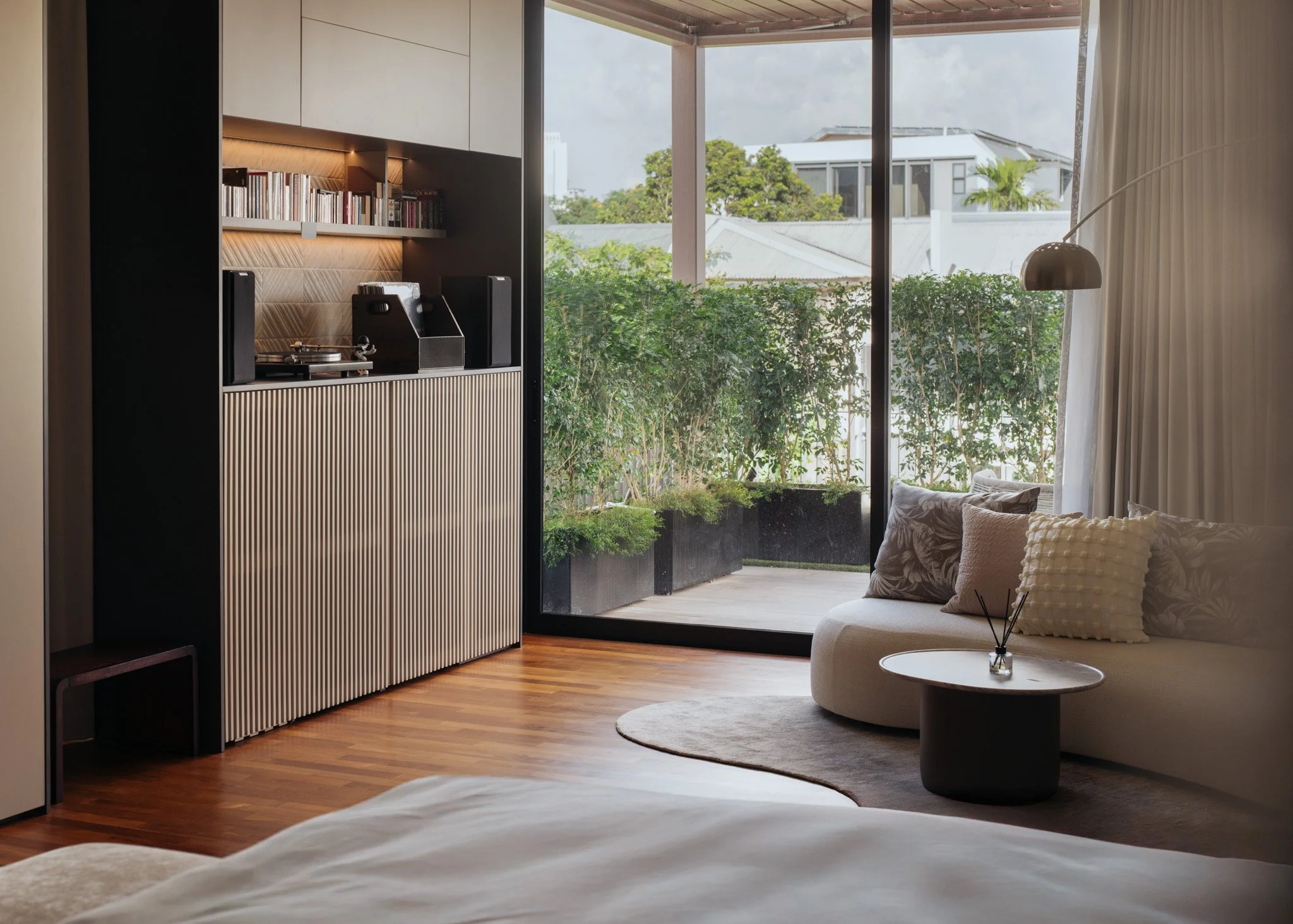 Master bedroom lounge area with audio player