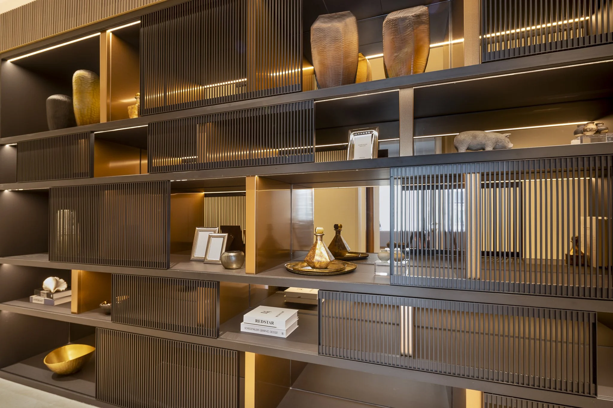 Interior design. Modern contemporary shelving with warm mood lighting.