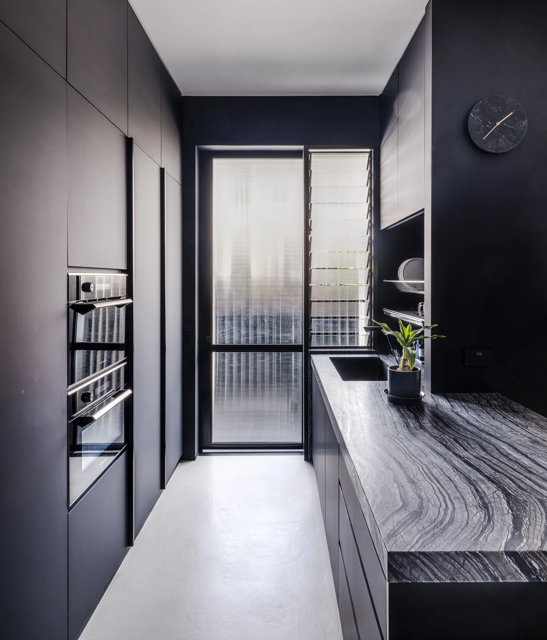 kitchen in a monochromatic black scheme