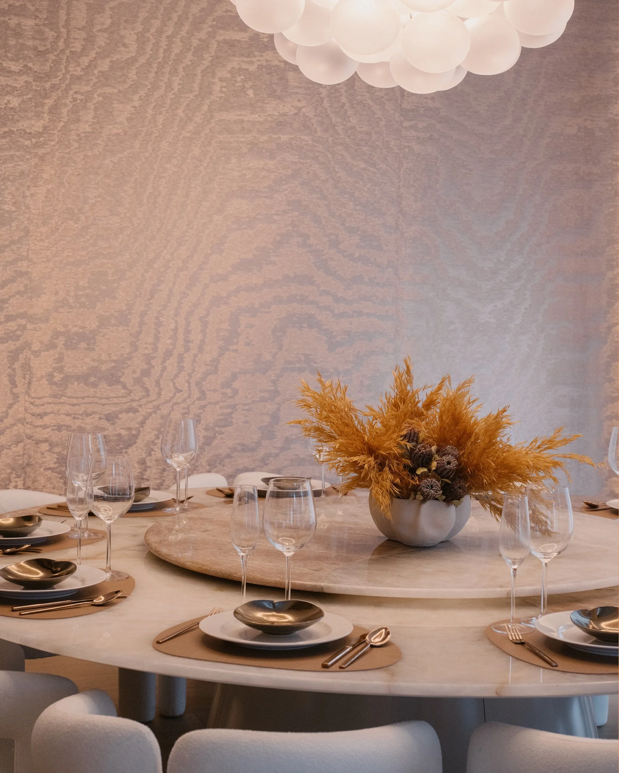 Close up of wallpaper and dining table setting