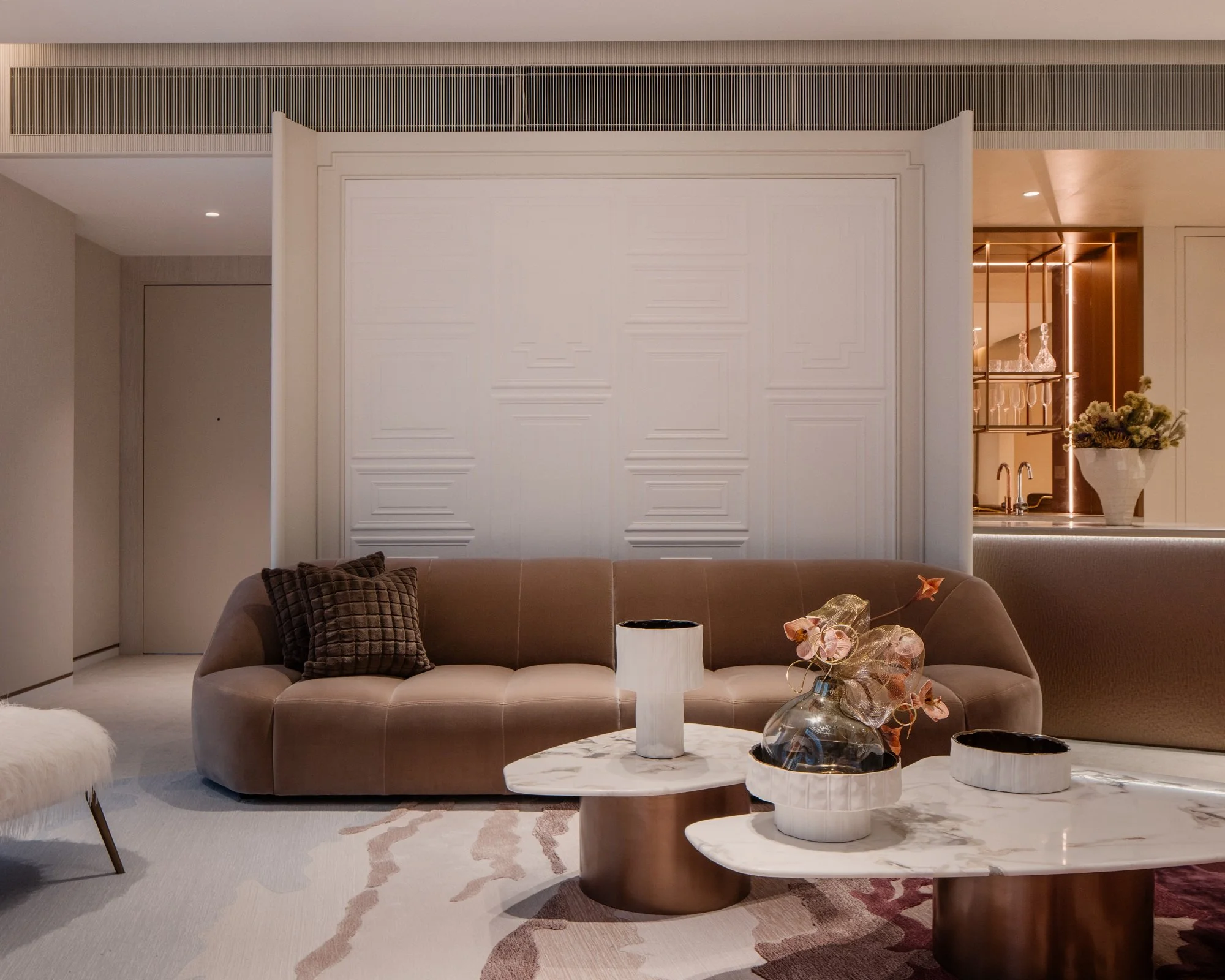 Sofa and soft textured backdrop in white