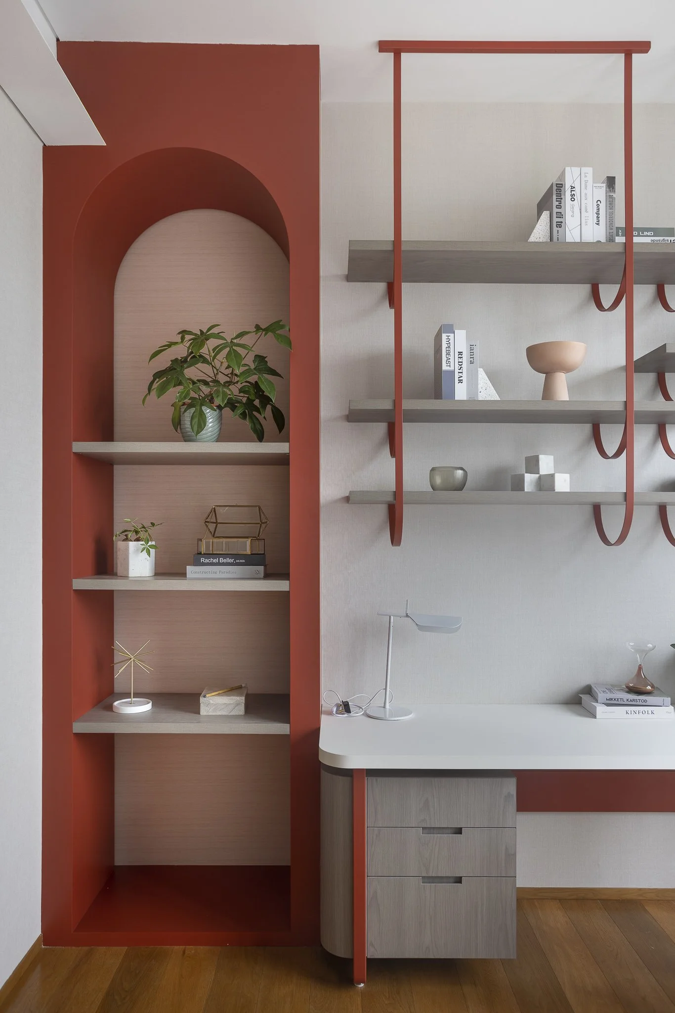 Interior design. Clean, contemporary youthful bedroom with pops of rust and pink tones.