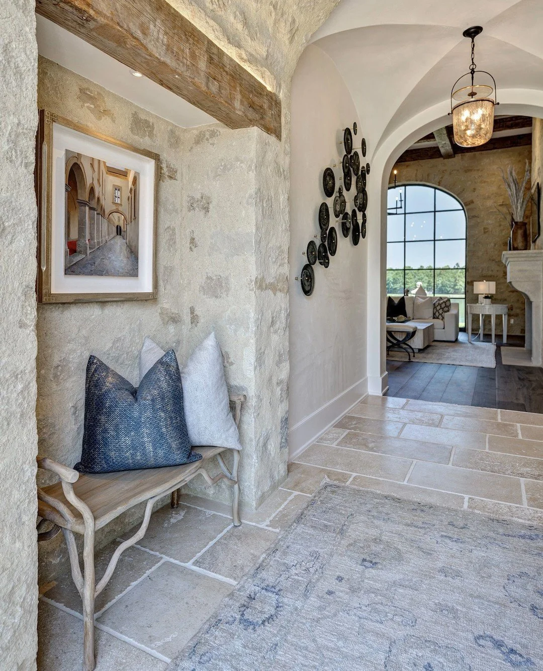 **A Grand Welcome, Designed to Last ✨**⁠
⁠
From the moment you step through the door, every detail of this entry was thoughtfully curated to create a lasting impression. The soaring barrel-vaulted ceilings, hand-applied textured finishes, exposed woo