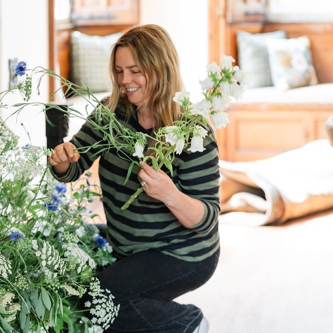 Florist arranging flowers at Treberfydd House wedding in Brecon