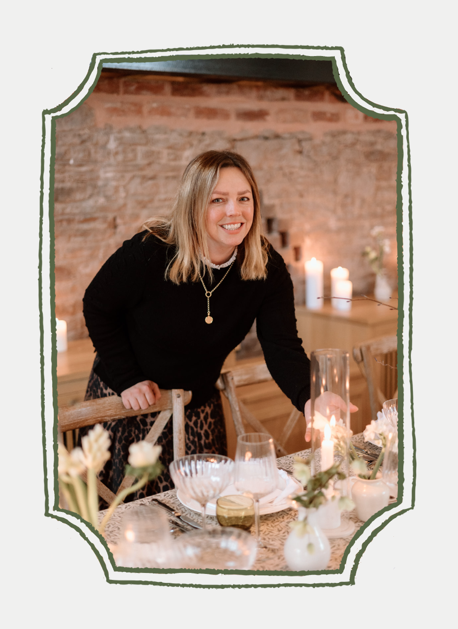 Florist arranging flowers at Llantilio House wedding