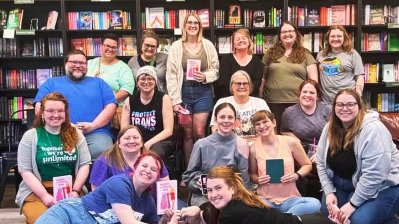 A book club reading Murder in the Dressing Room by Holly Stars