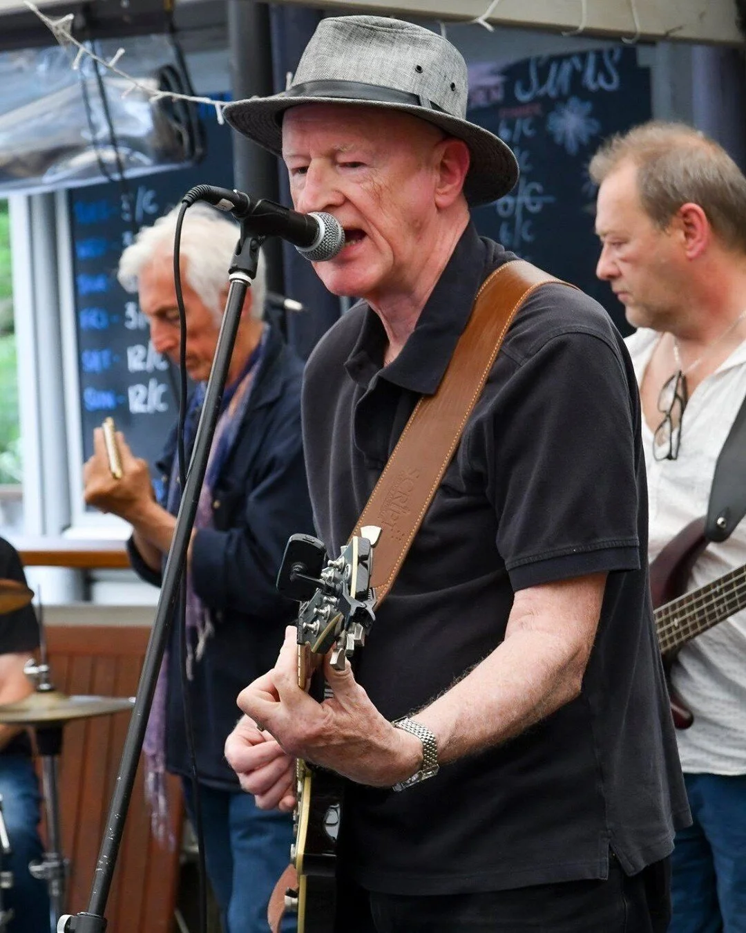 Meet Chris Martin Murphy. From age 16, Chris has had a parallel music career between acoustic solo singer guitarist in cafes and at parties (in UK, Australia, Spain and USA), and lead guitarist and blues harmonica player in rock and blues bands (in U