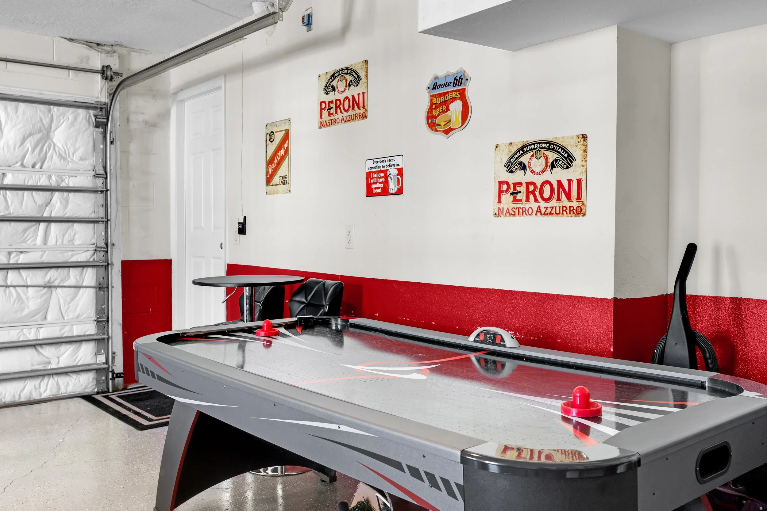 games-room-orlando-villa-family-air-hockey.jpg