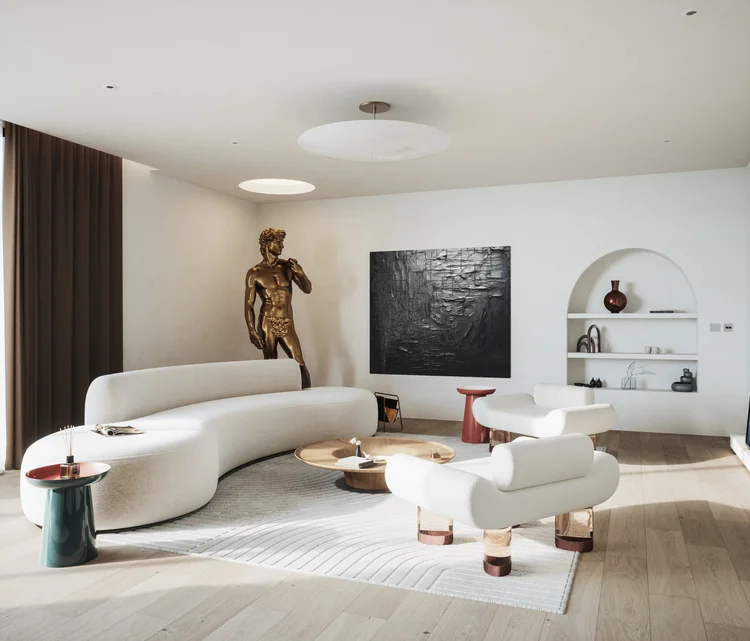 Sculptural white seating, warm timber and art in a light-filled living room.