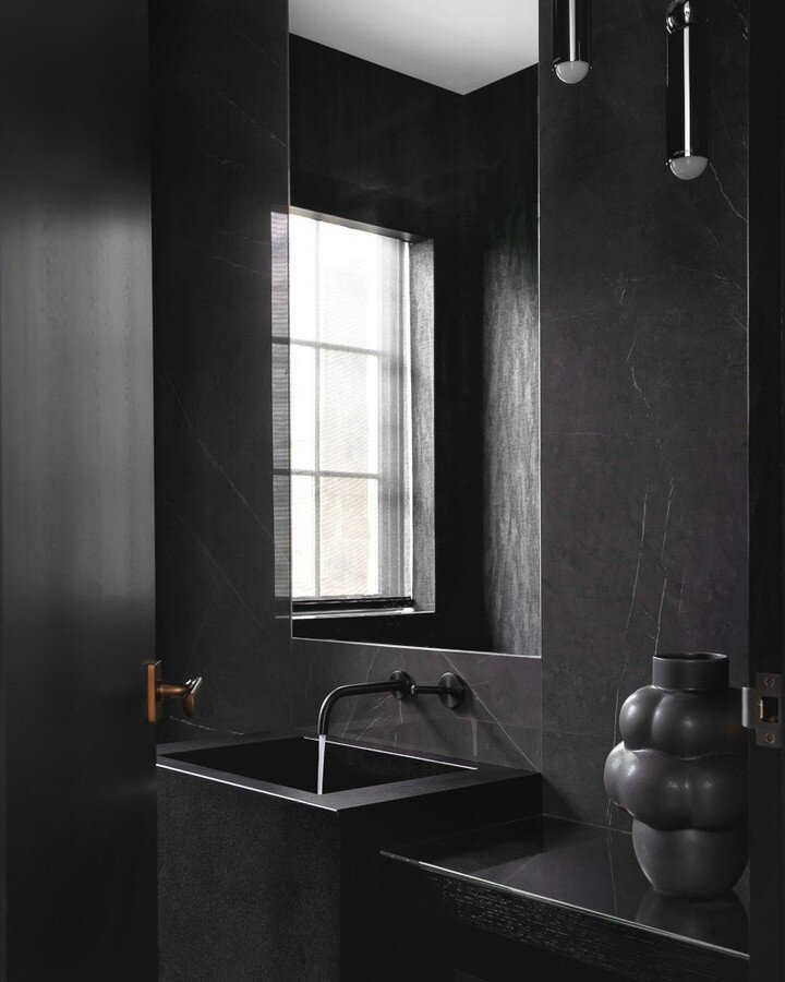 All black for this modern powder room.